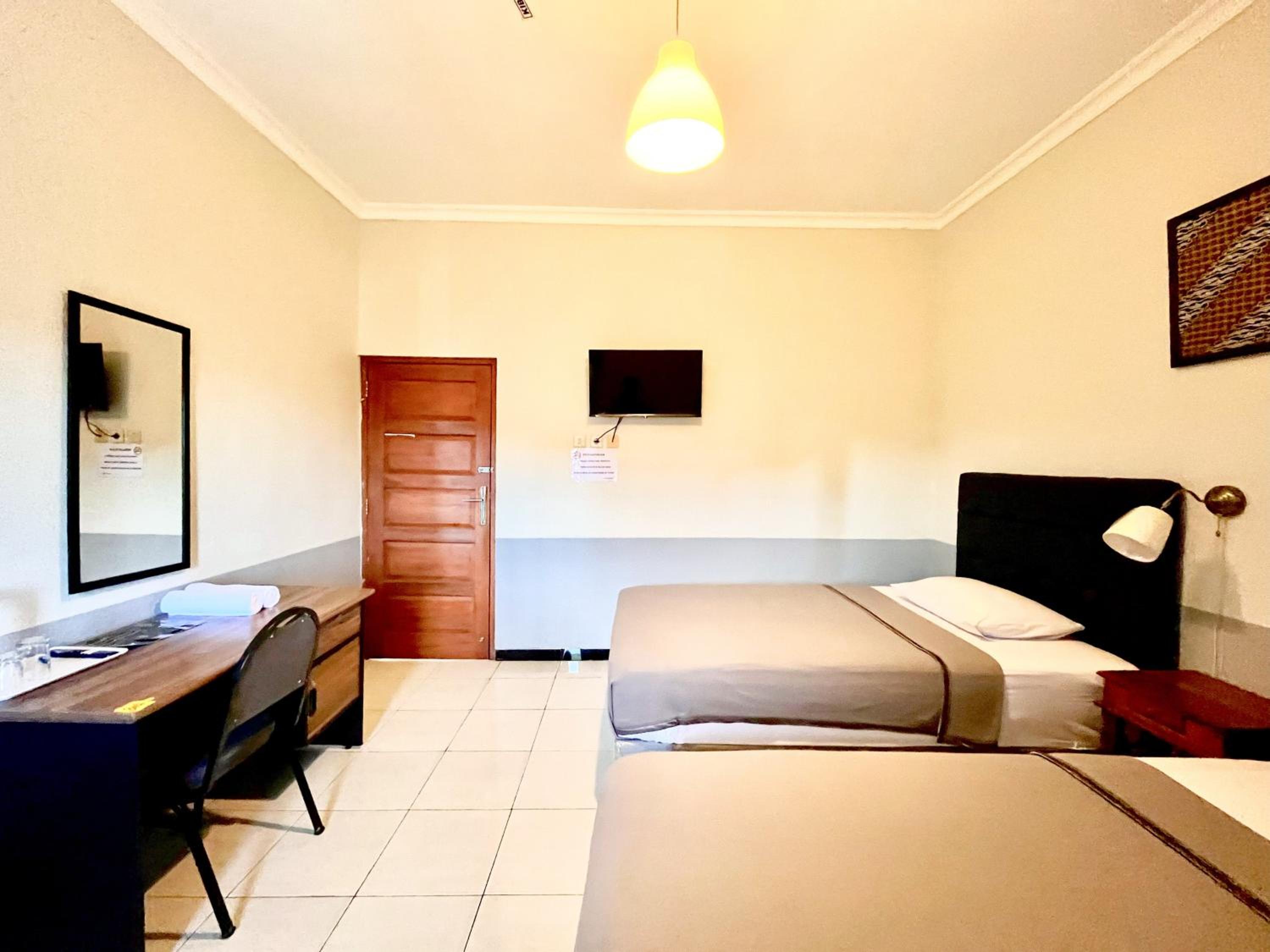Deluxe Twin Room - Photo 10