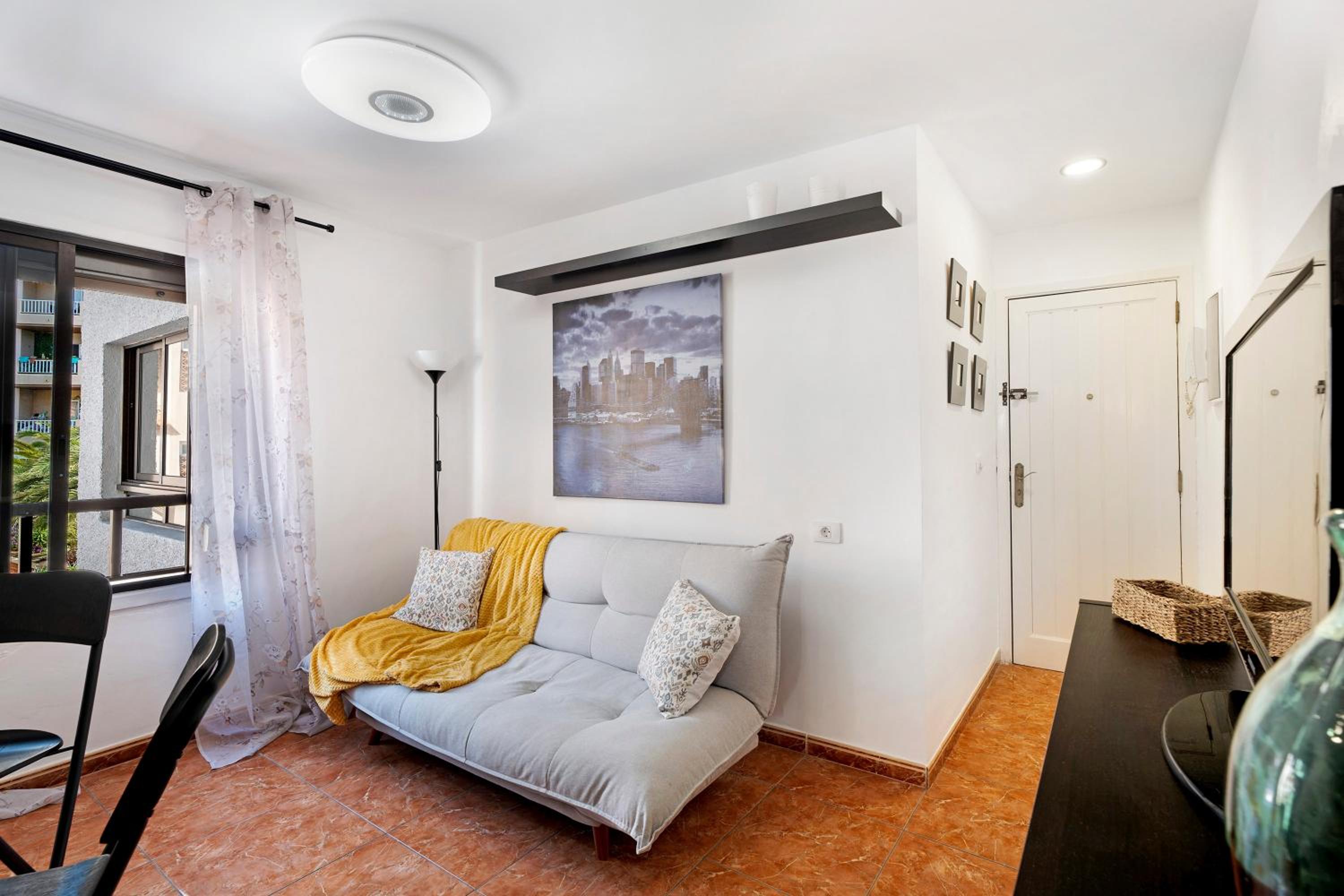 Apartamento de un dormitorio superior con balcón
