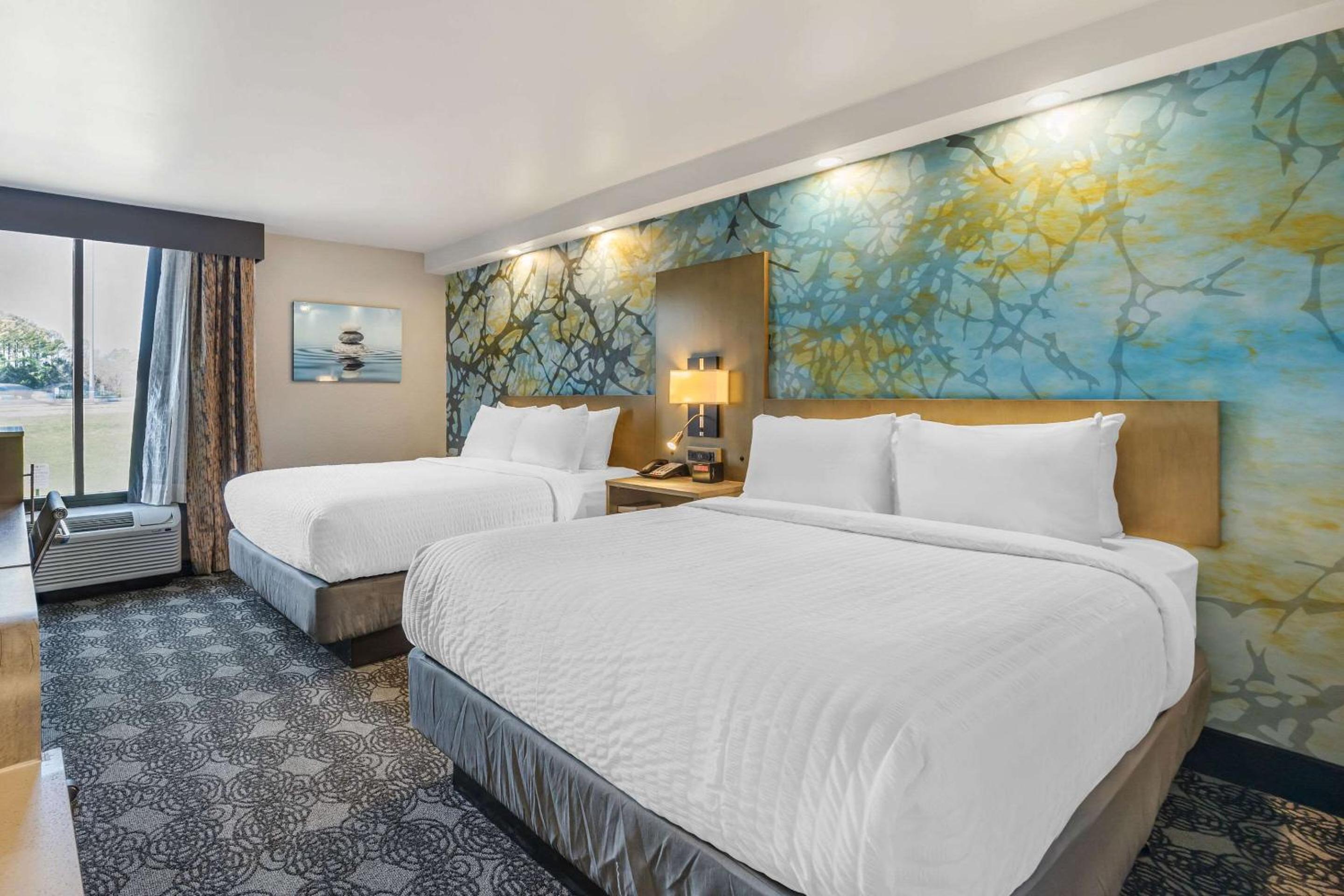 Superior Queen Room with Two Queen Beds - Photo 1