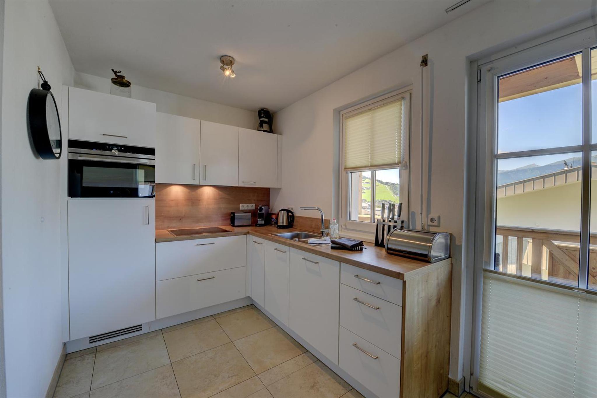 Two-Bedroom Apartment with Balcony and Mountain View  photo 2