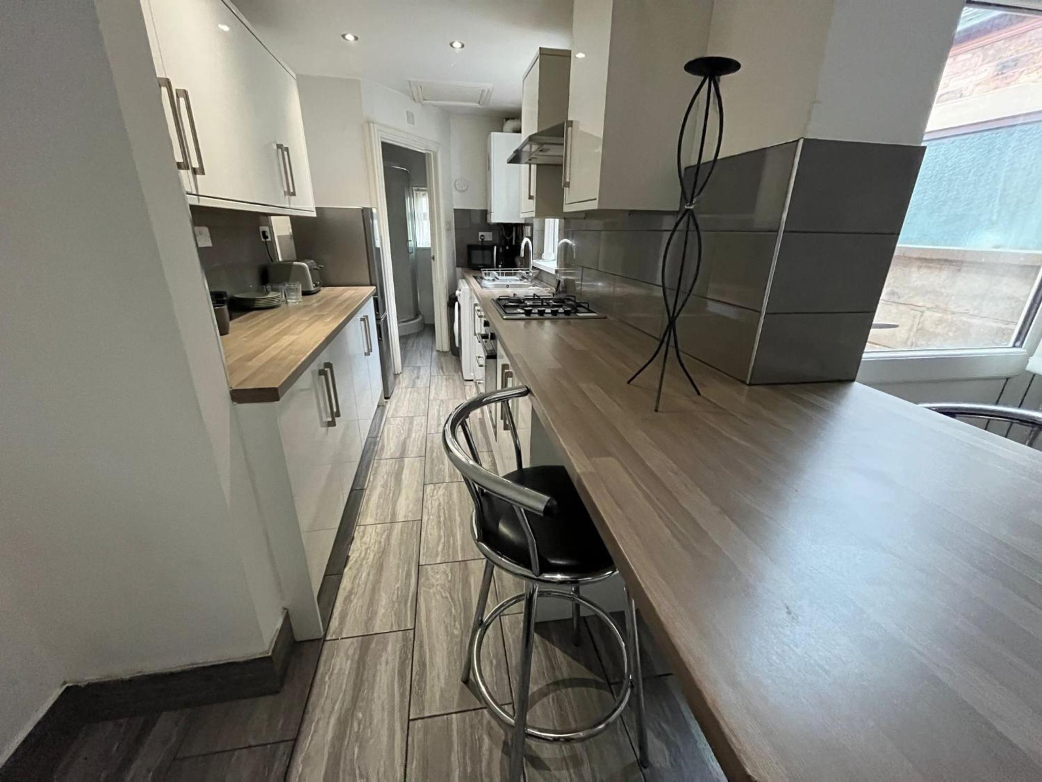 Three-Bedroom Apartment photo 2