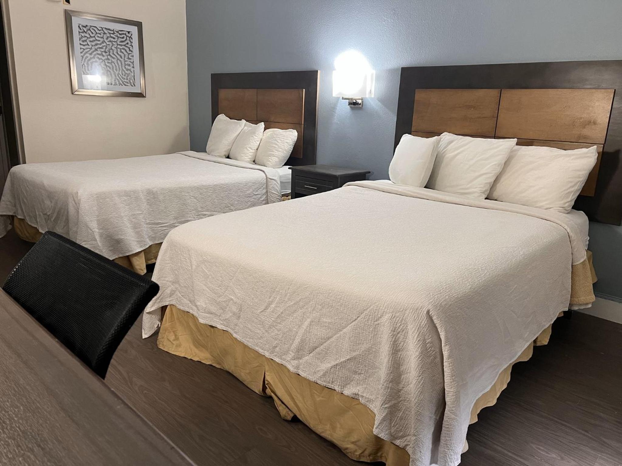 Premium Room with Two Queen Beds Disability Access Roll-In Shower Smoke Free (Upgraded Bedding and Snack Box) - Photo 4