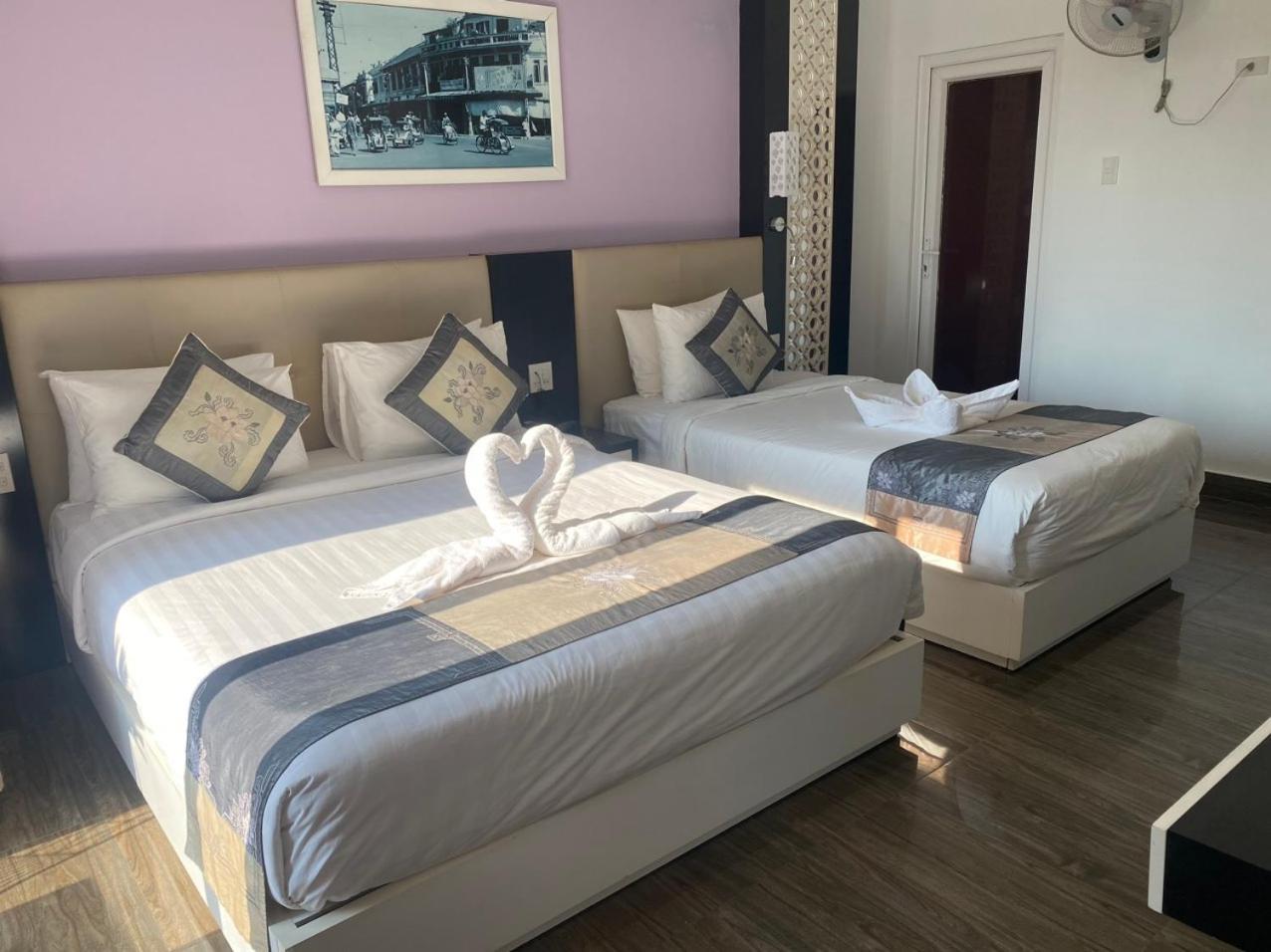 Deluxe Triple Room - Photo 23