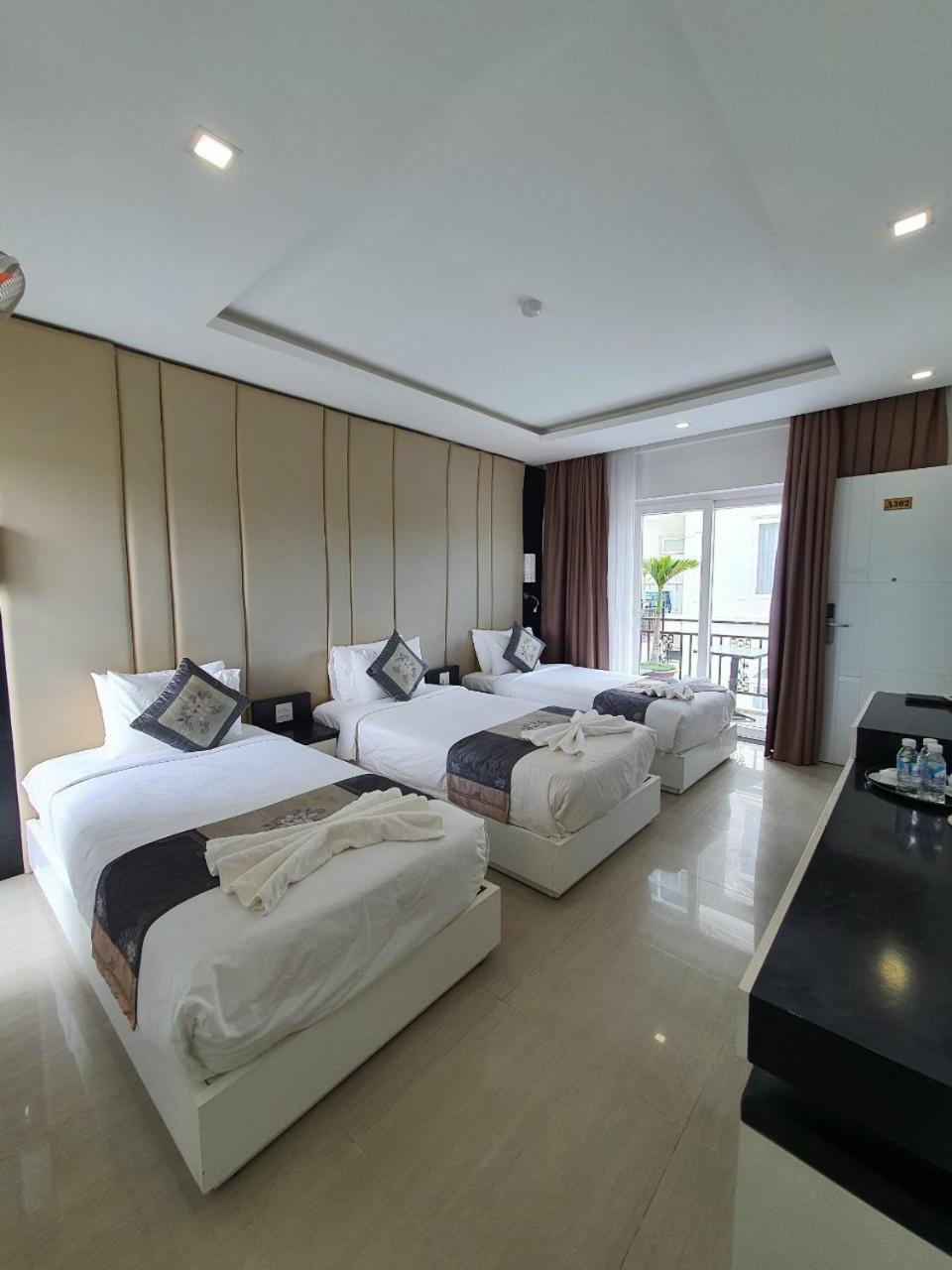 Deluxe Triple Room - Photo 2
