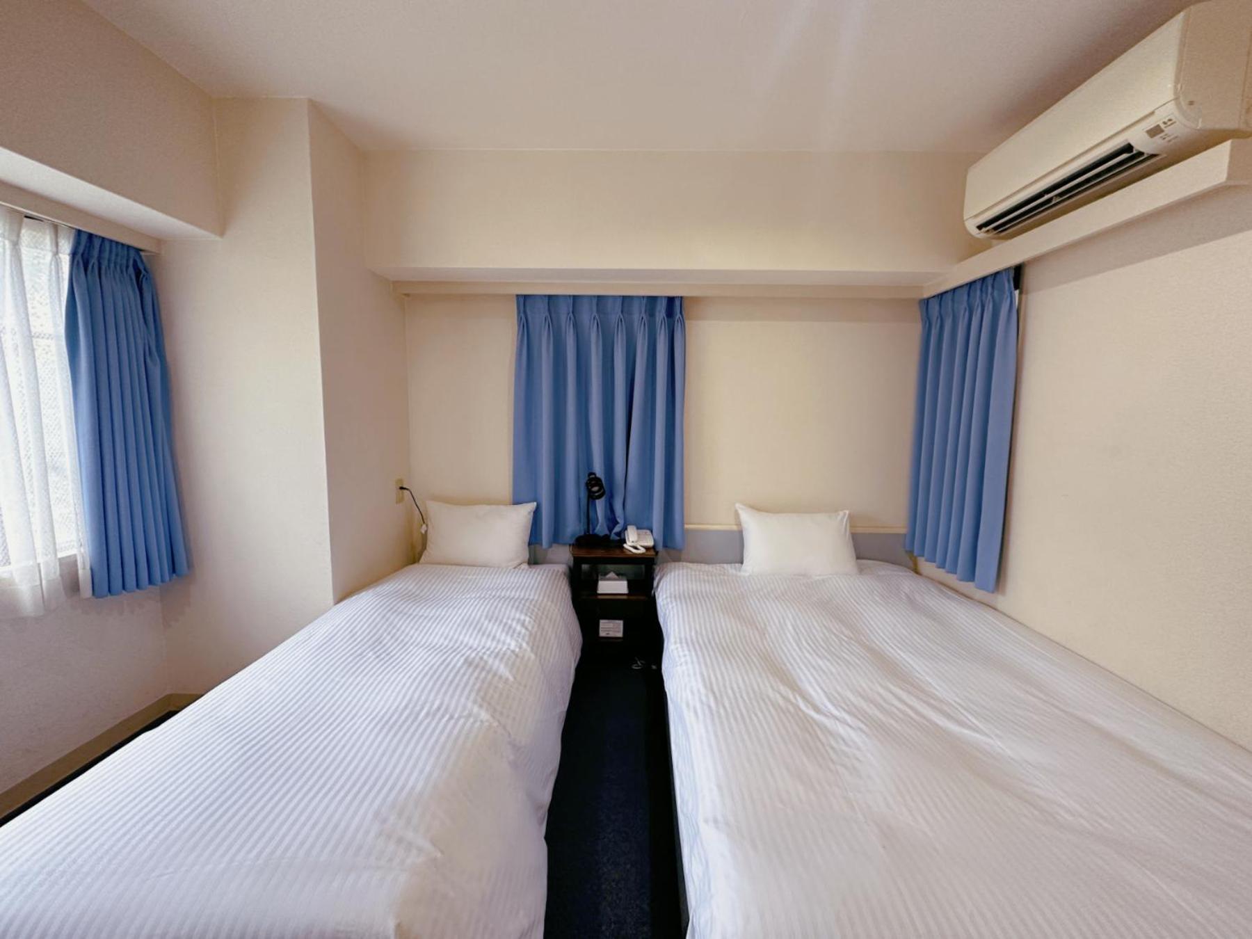 Twin Room - Non-Smoking - Photo 10