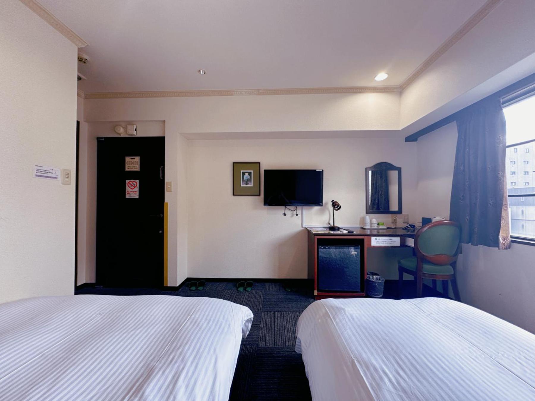 Twin Room - Non-Smoking - Photo 3