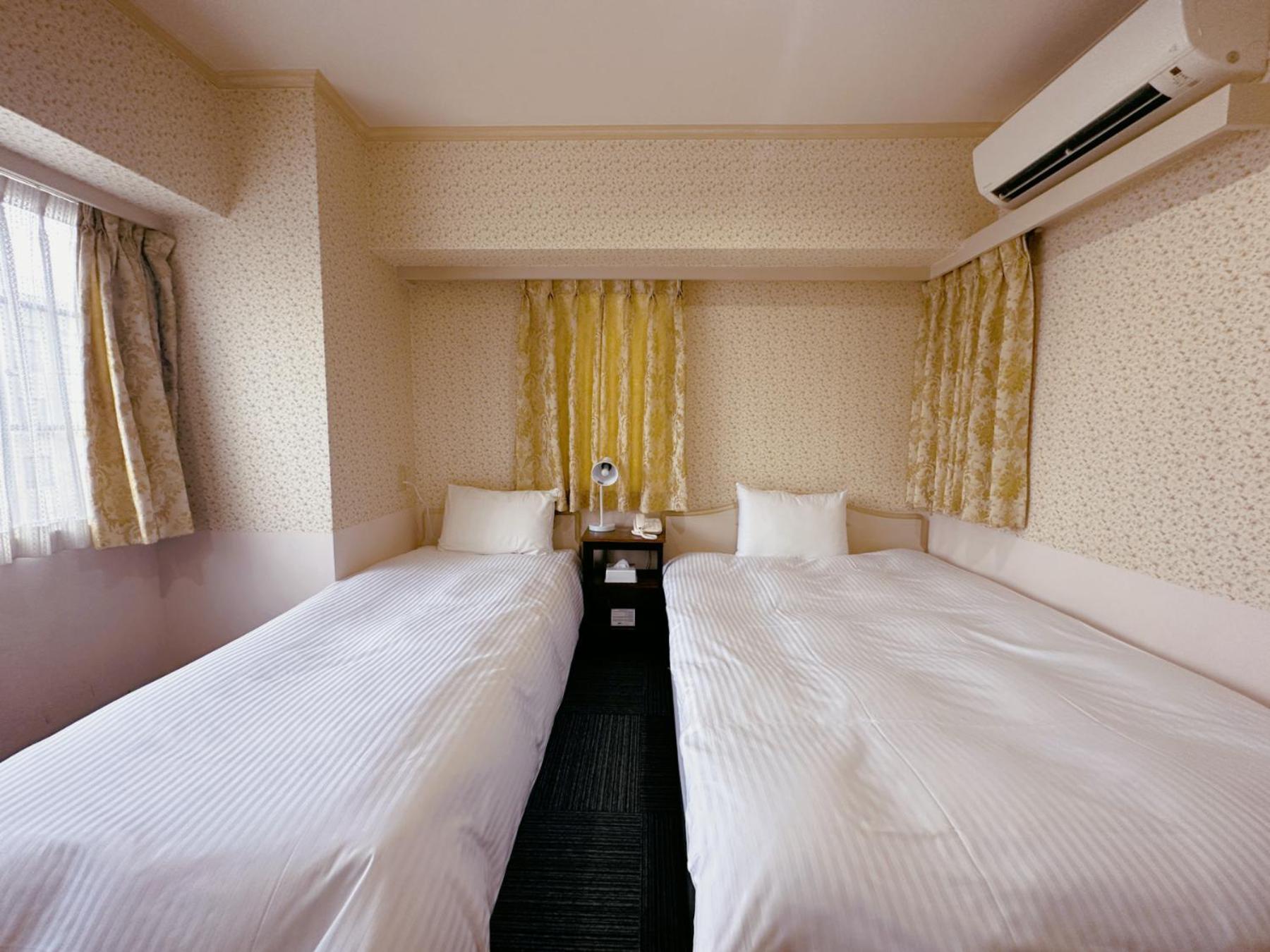 Twin Room - Non-Smoking - Photo 7