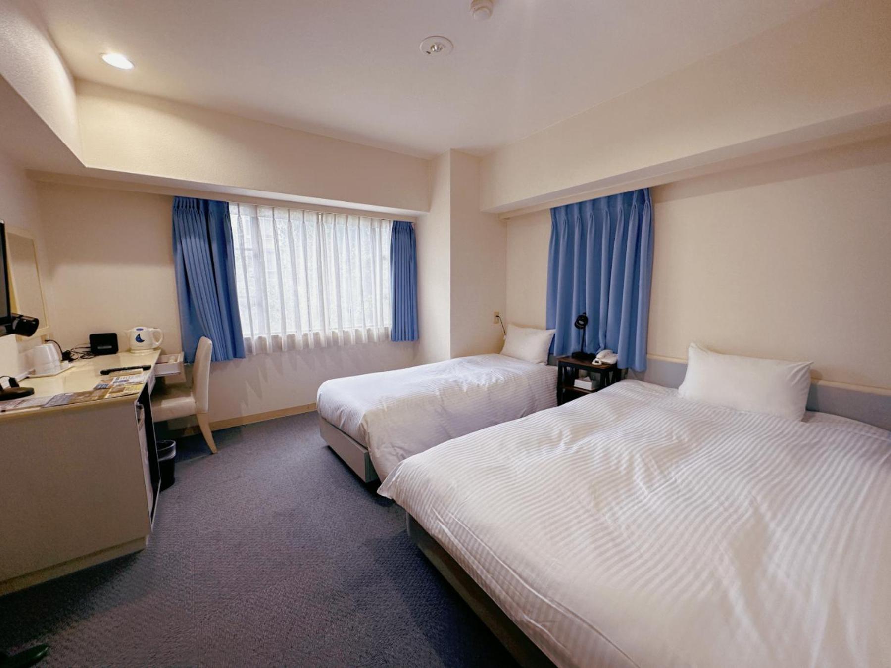 Twin Room - Non-Smoking - Photo 1