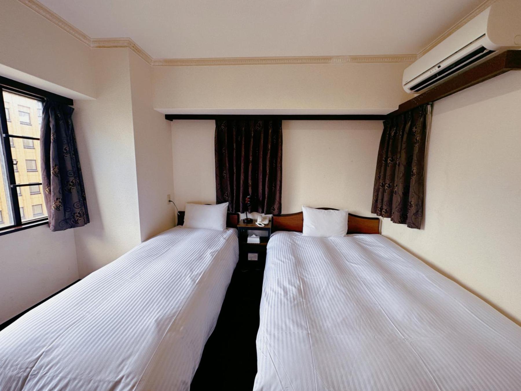 Twin Room - Non-Smoking - Photo 4