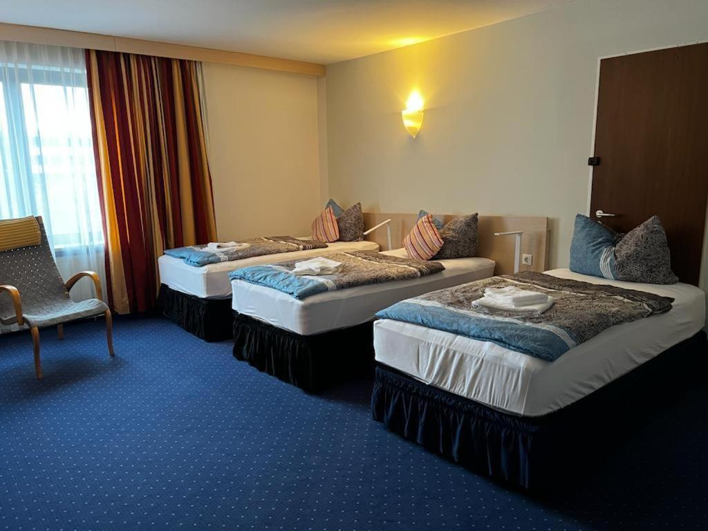 Budget Triple Room - Photo 1