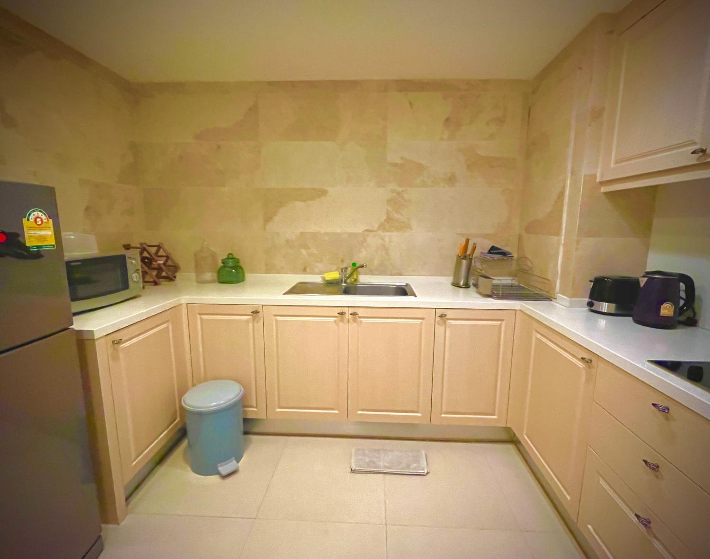 Three-Bedroom Apartment - Photo 16