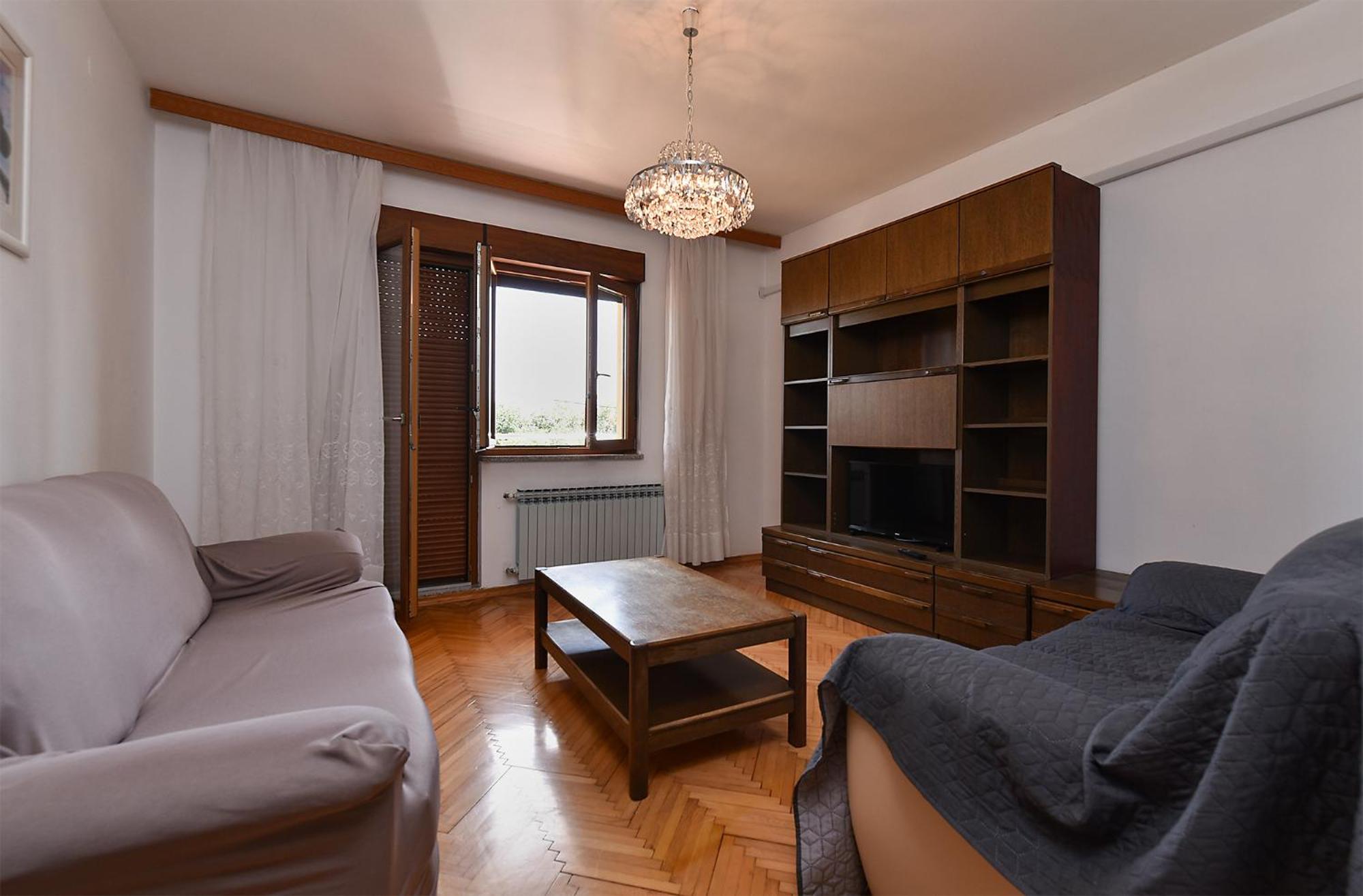 Three-Bedroom Apartment photo 1