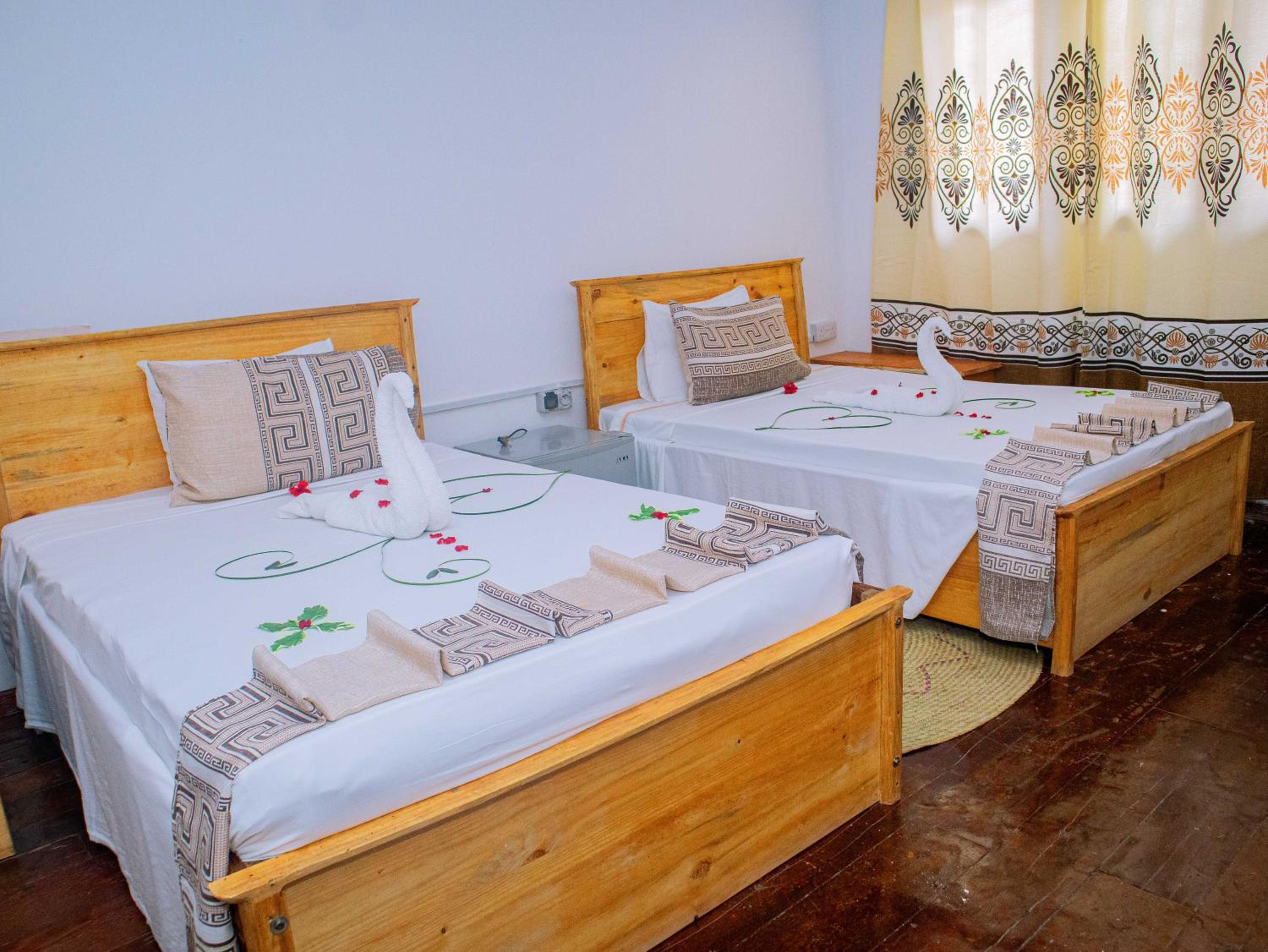 Standard Twin Room - Photo 16