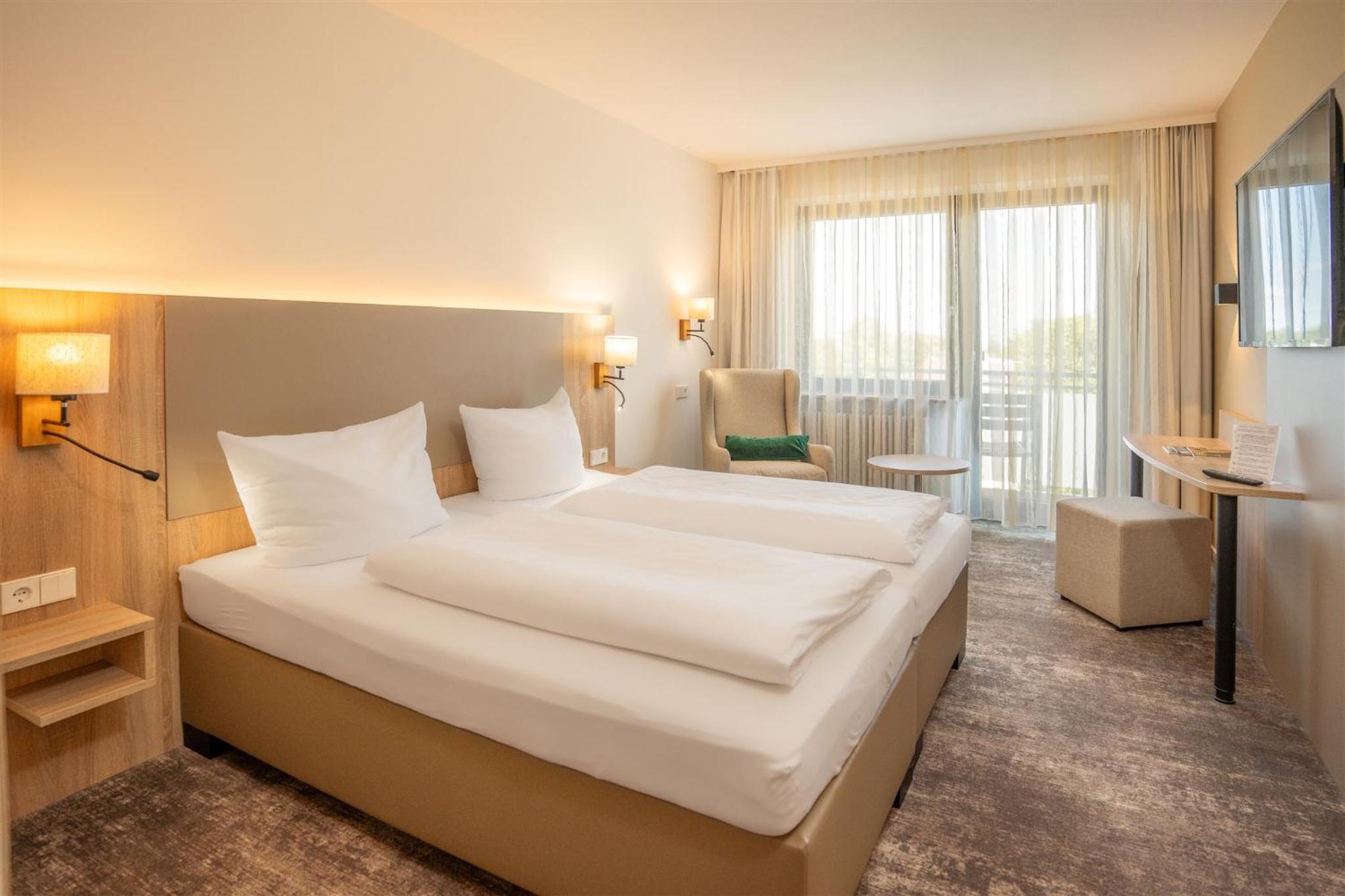 Comfort Room with Balcony - Photo 1