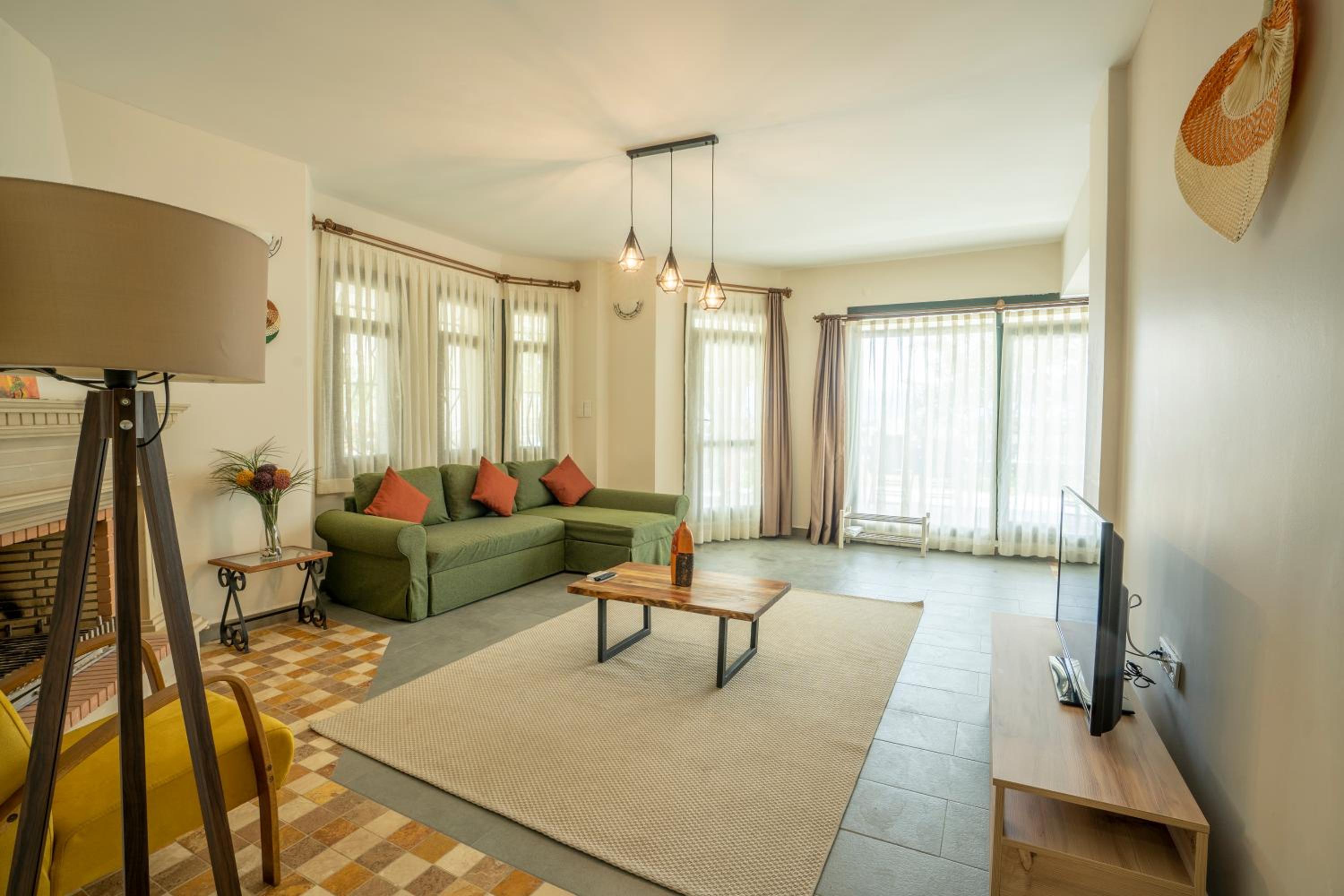 Two-Bedroom Apartment with Garden and Sea View