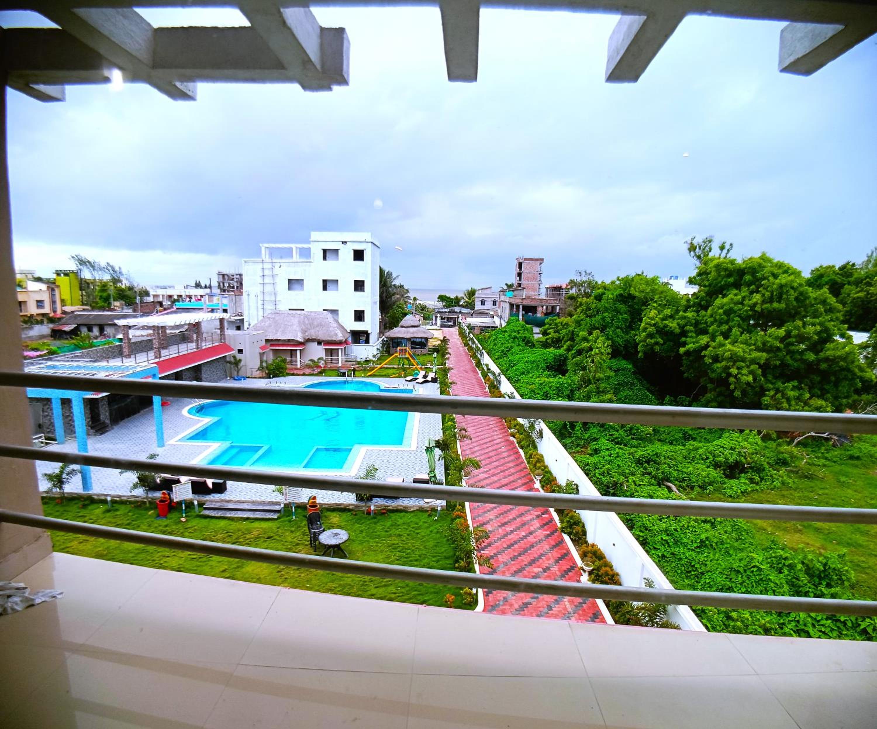 Family Room with Balcony Pool View photo 3
