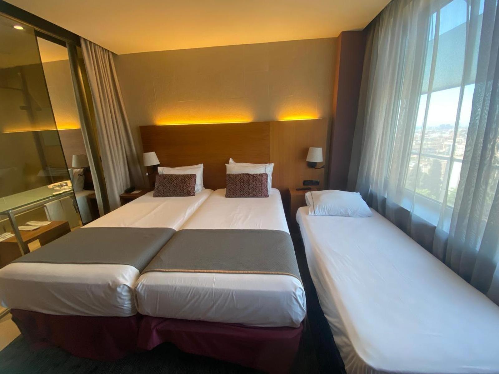 Double or Twin Room with Extra Bed (2 Adults + 1 Child) - Photo 6