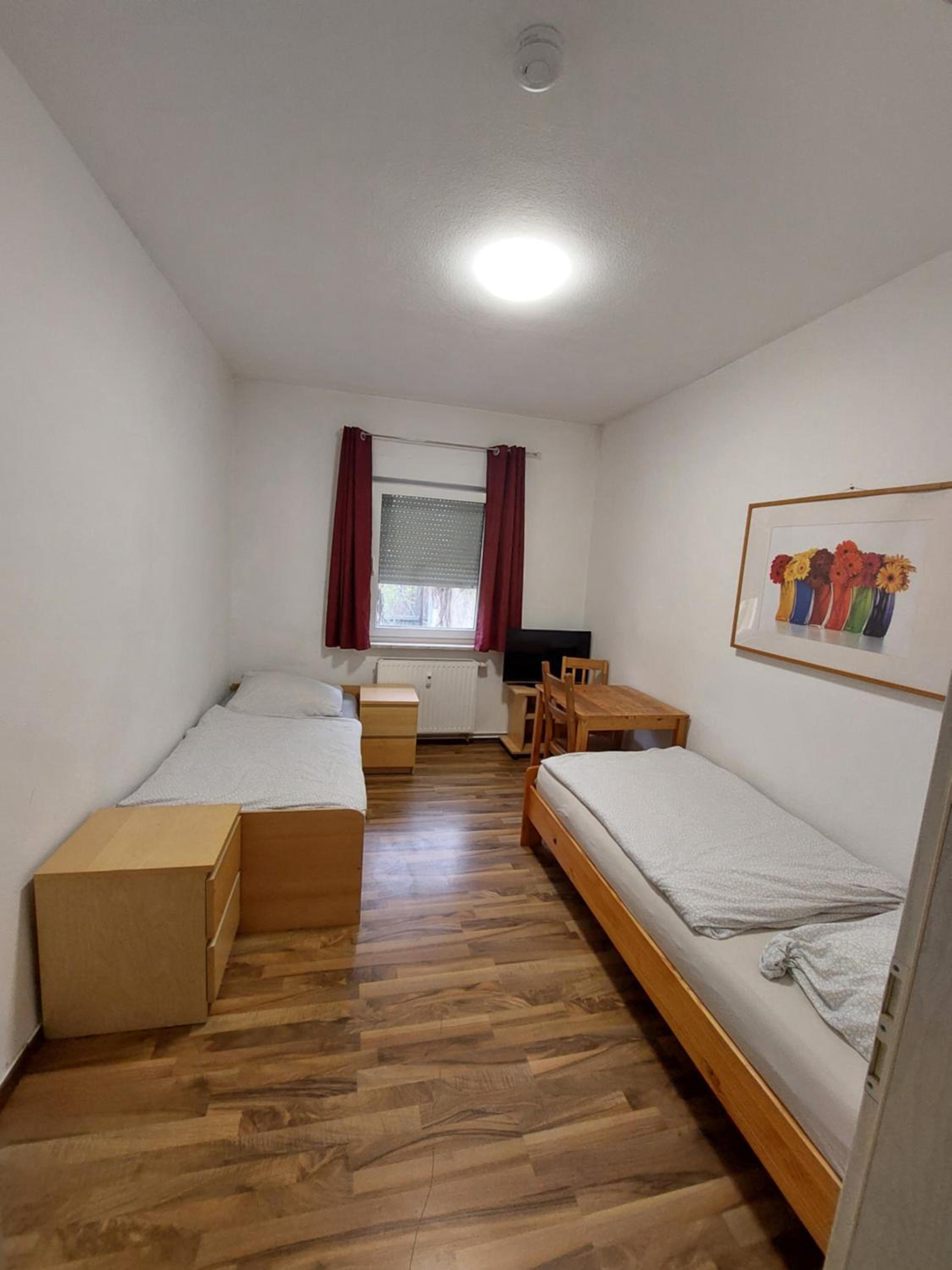 Three-Bedroom Apartment photo 1