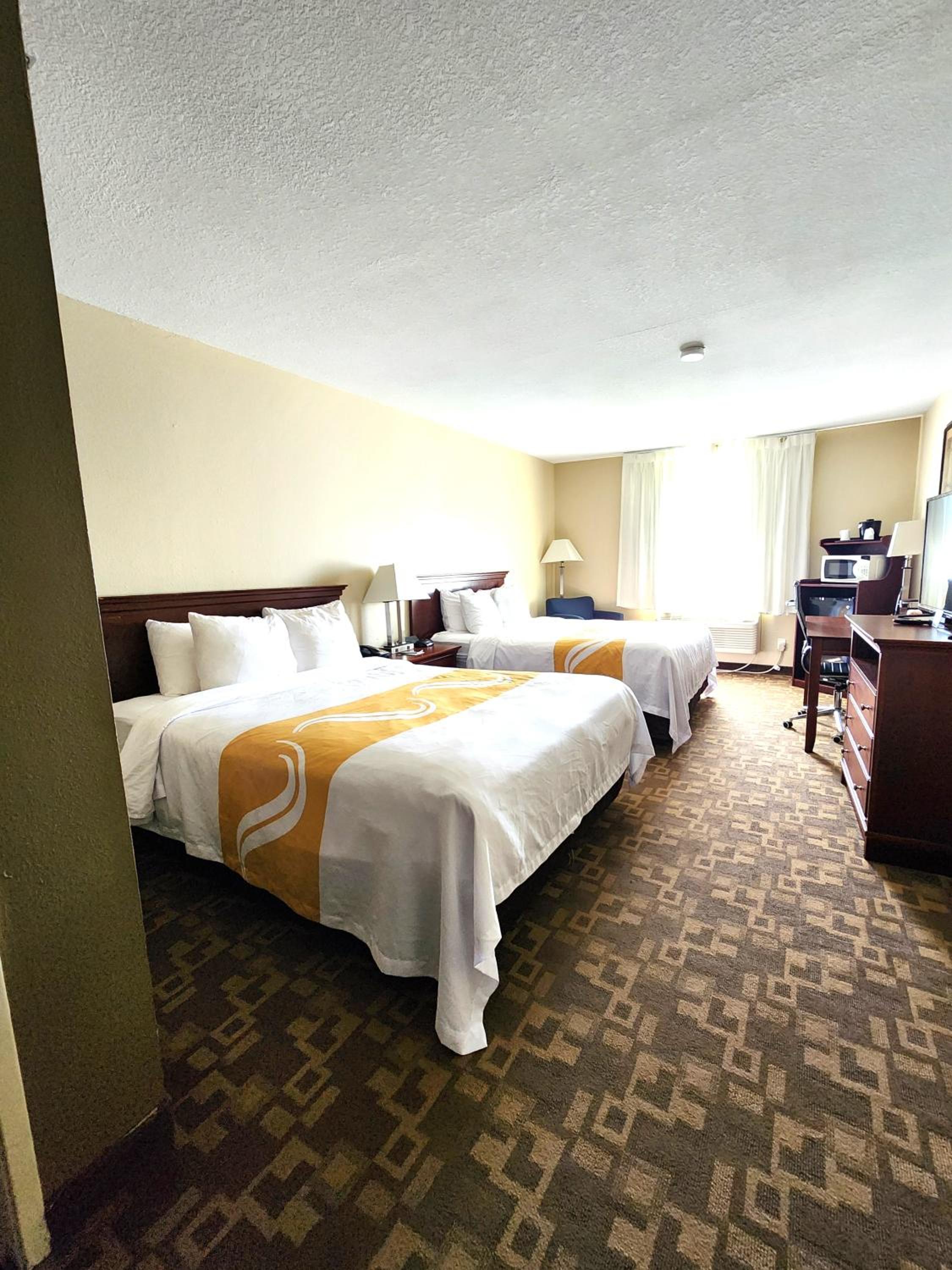 Queen Room with Two Queen Beds - Non-Smoking - Photo 1
