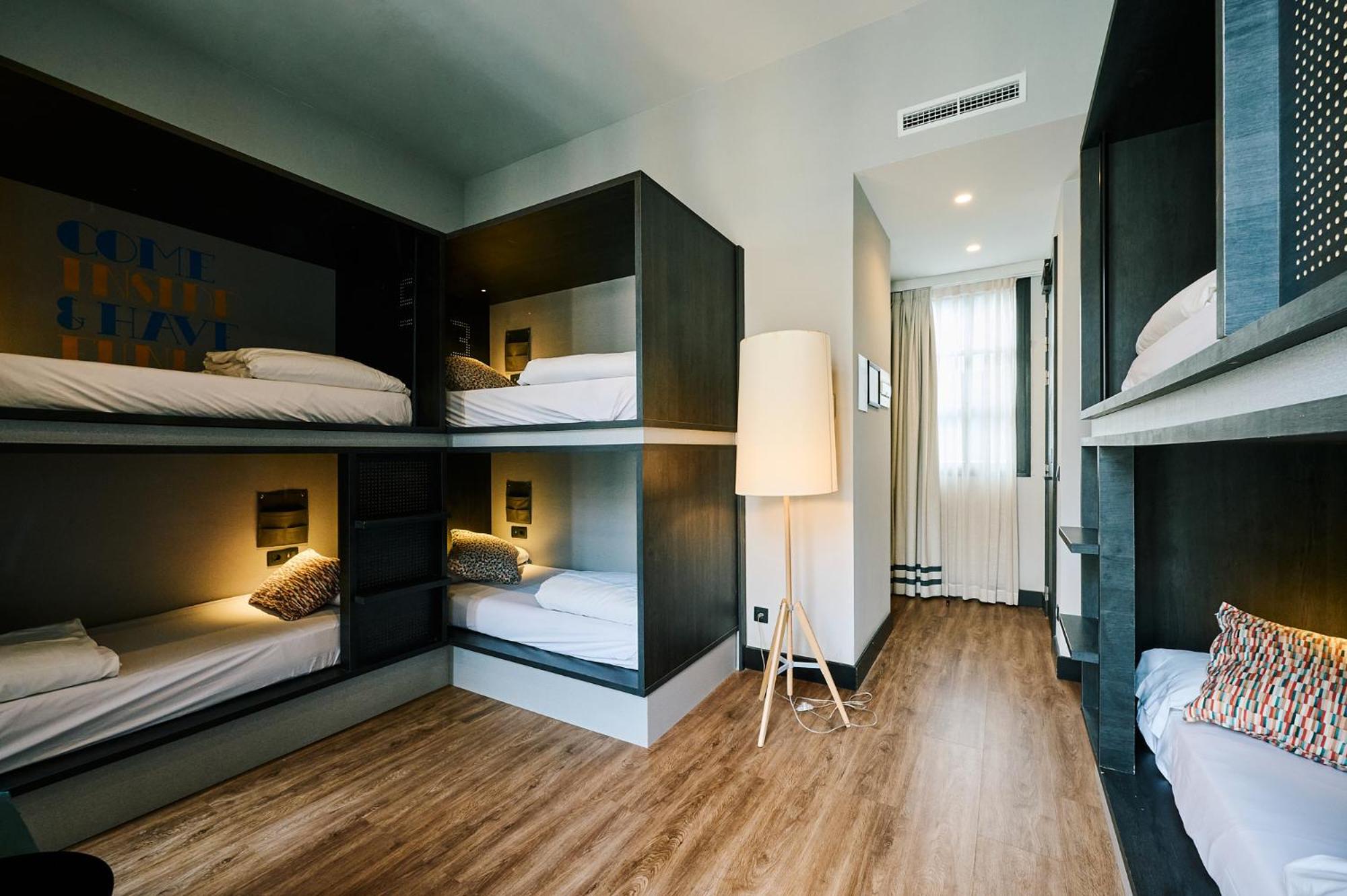 Cama en habitación compartida de 6 camas