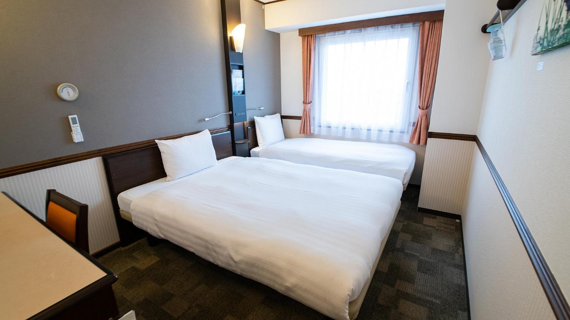 Twin Room - Non-Smoking - Photo 1