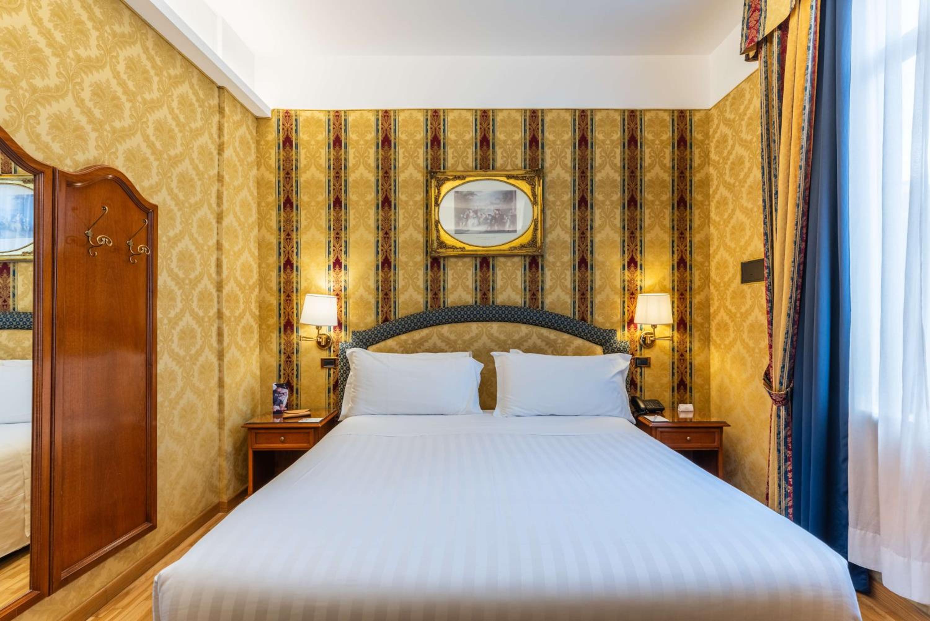Economy room with double bed and internal window to hall