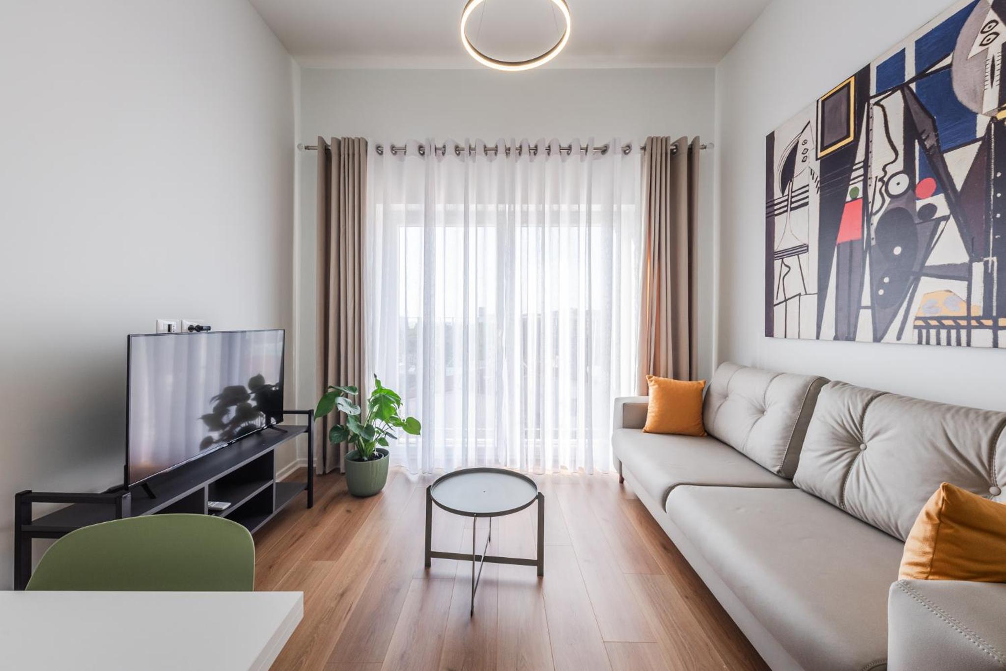 One-Bedroom Apartment with Balcony and Sea View