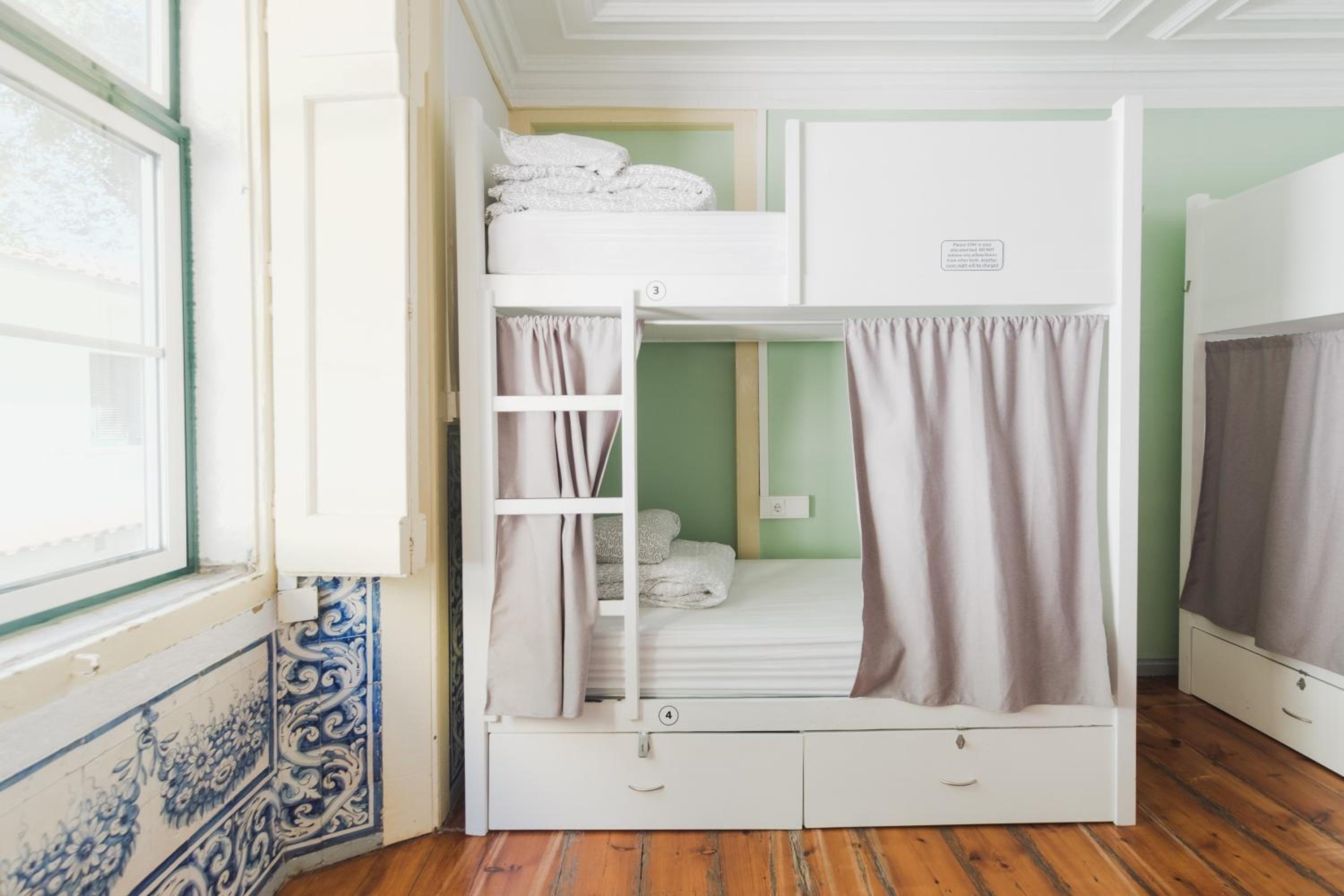 Bed in 6-Bed Female Dormitory Room with Bathroom  photo 1