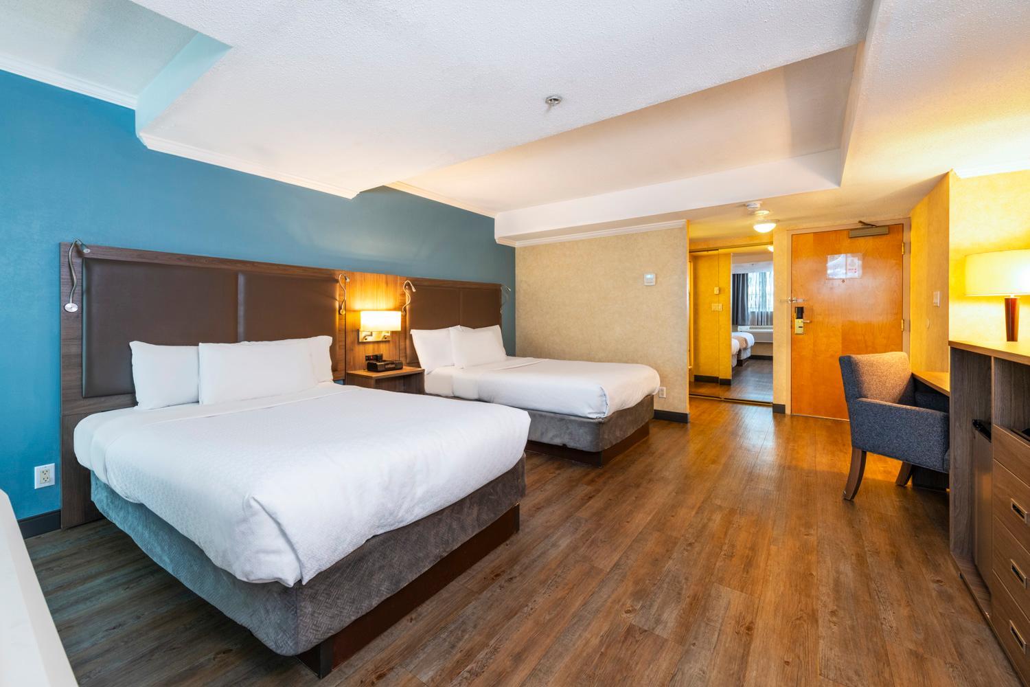 Efficiency Quadruple Room - Non Smoking - Photo 1