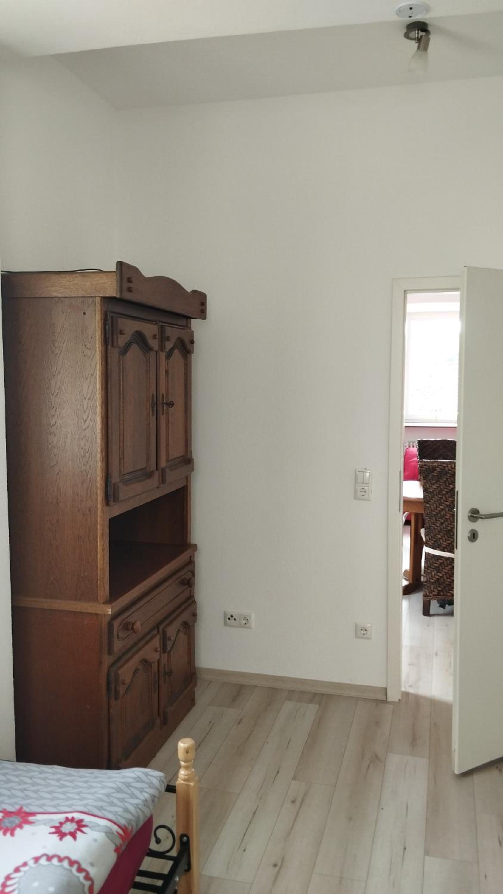 Three-Bedroom Apartment - Photo 12