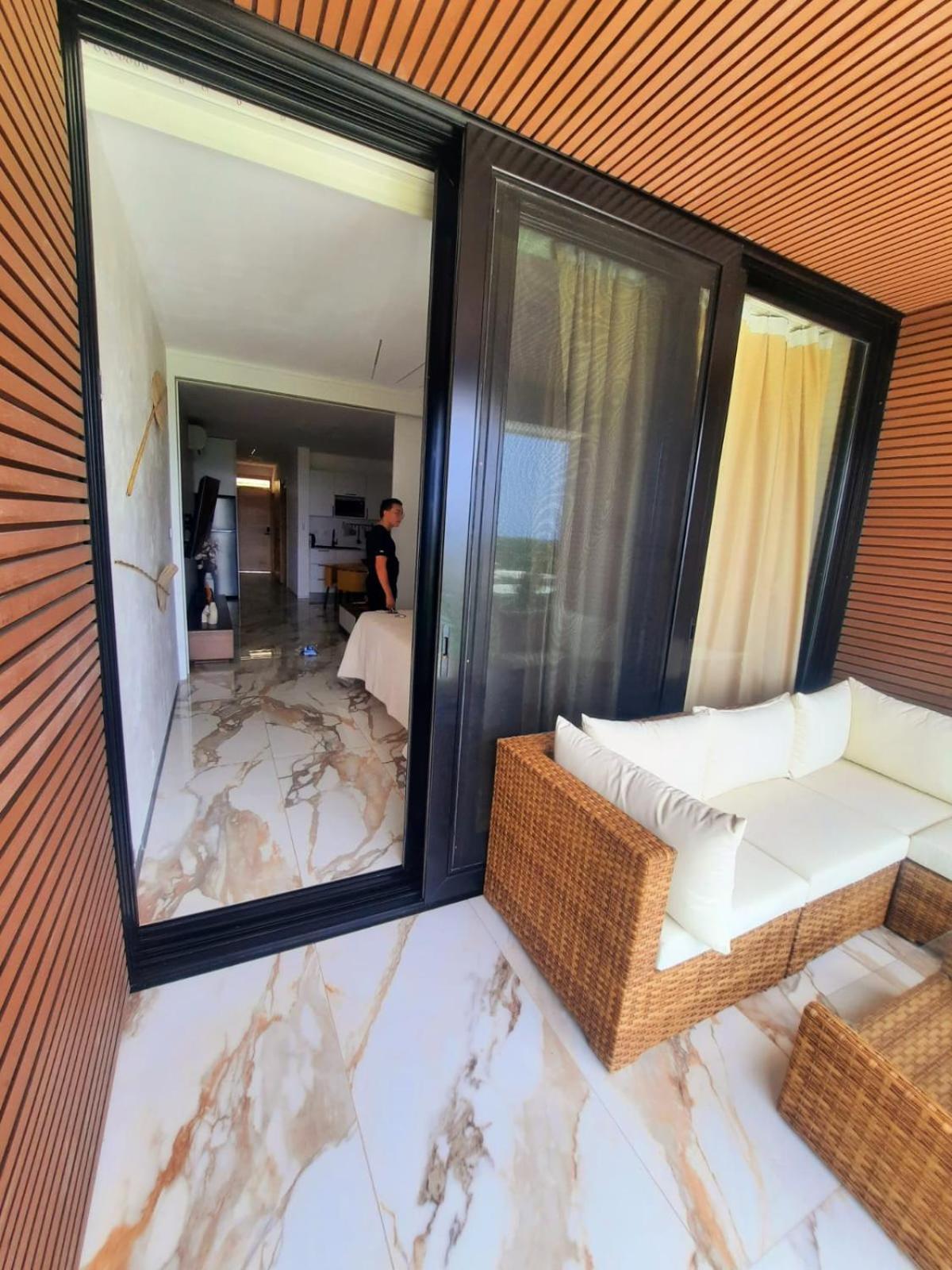 One-Bedroom Apartment with Balcony and Sea View
