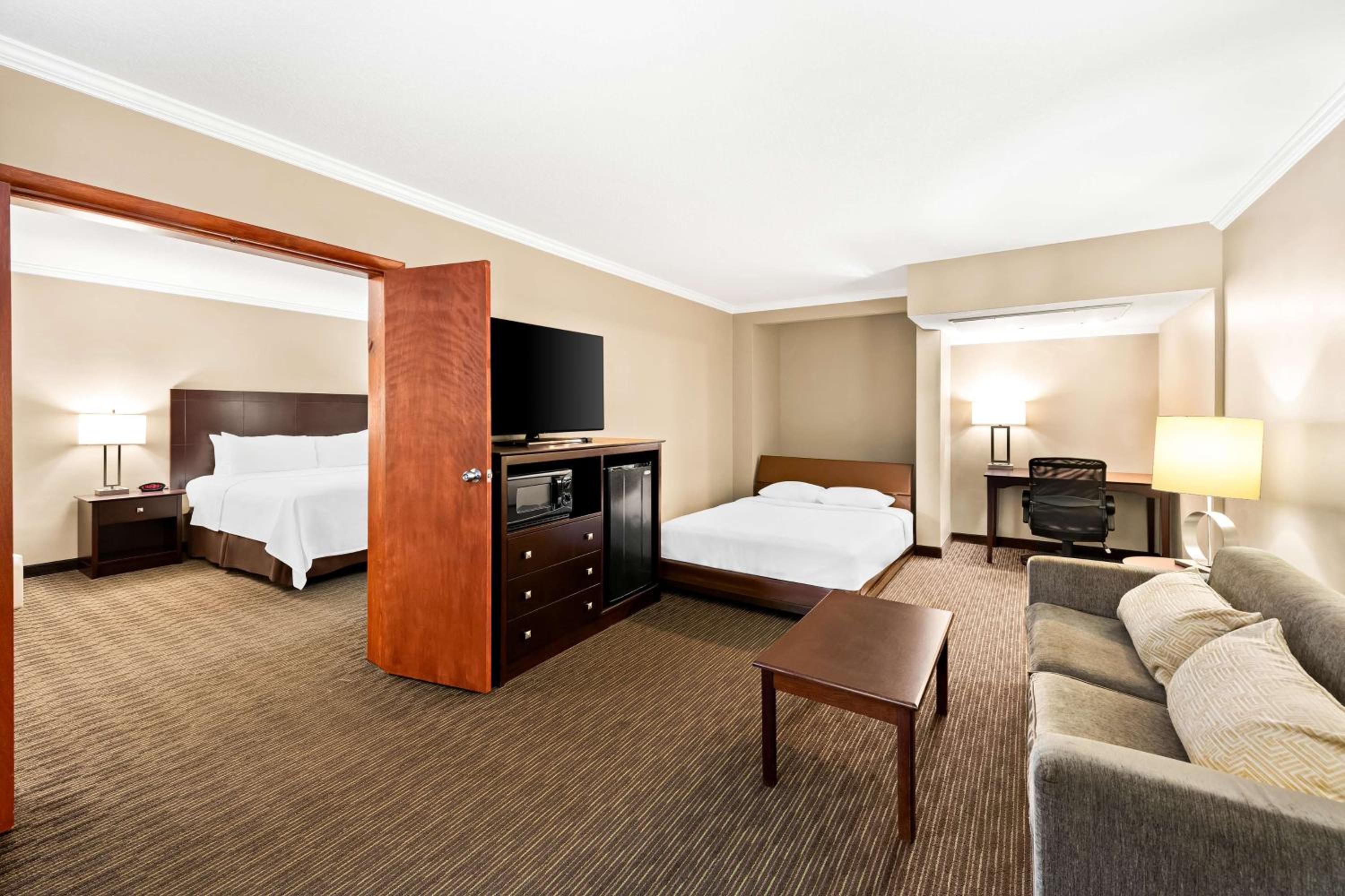 Two-Room King Suite with Murphy Bed and Pool View - Non-Smoking