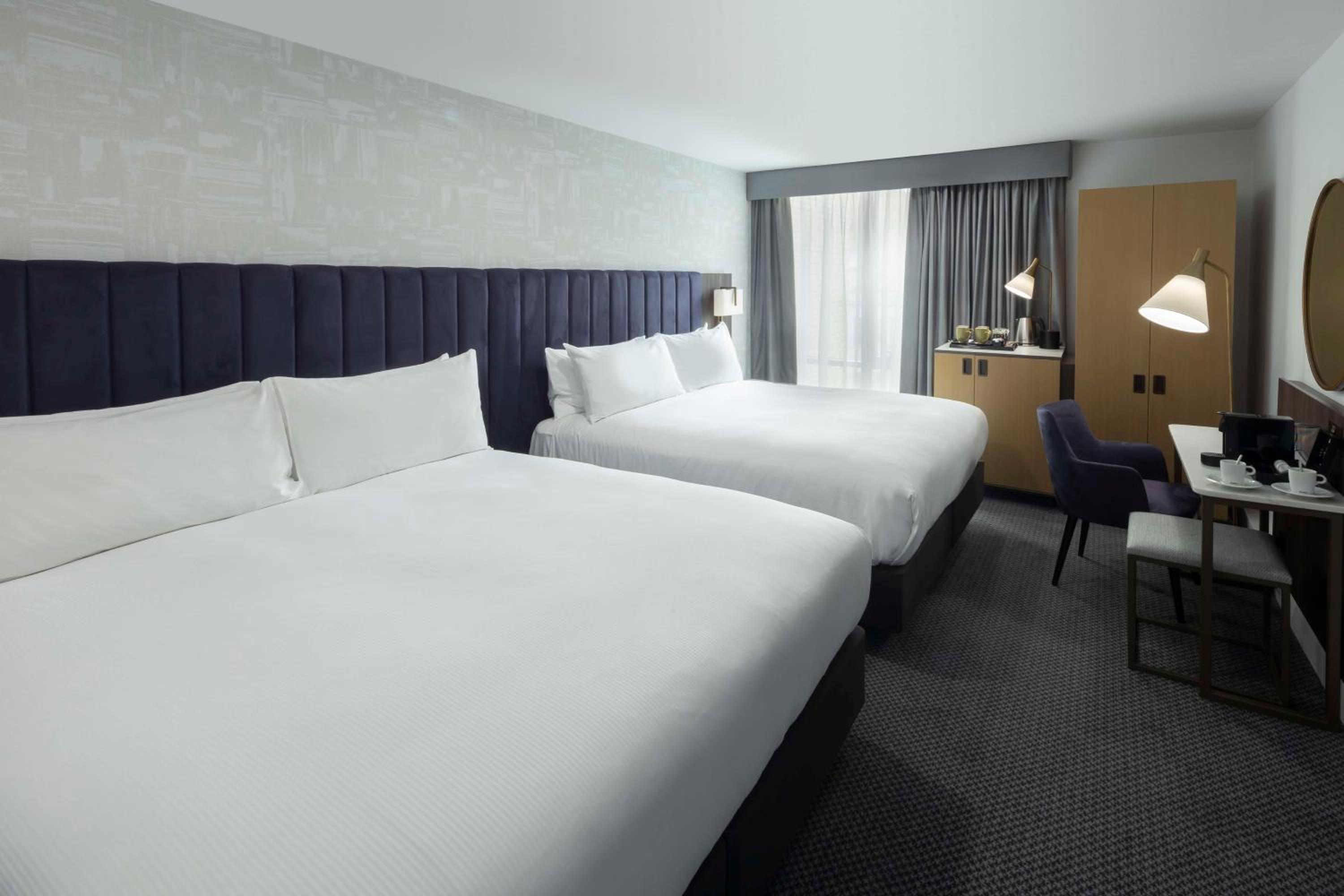 Deluxe King Room with Two King Beds - Photo 1