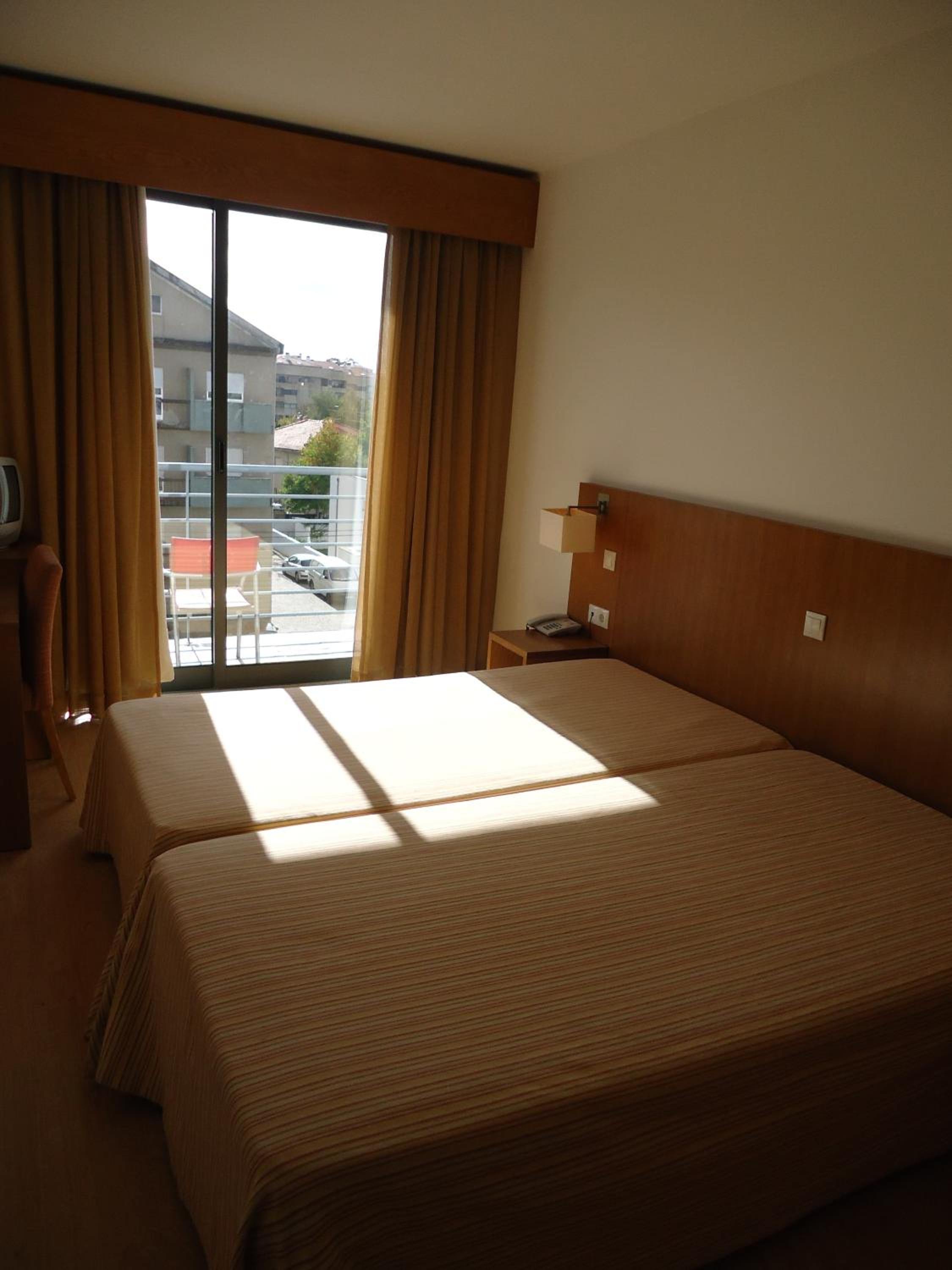 Twin Room with Balcony - Photo 1