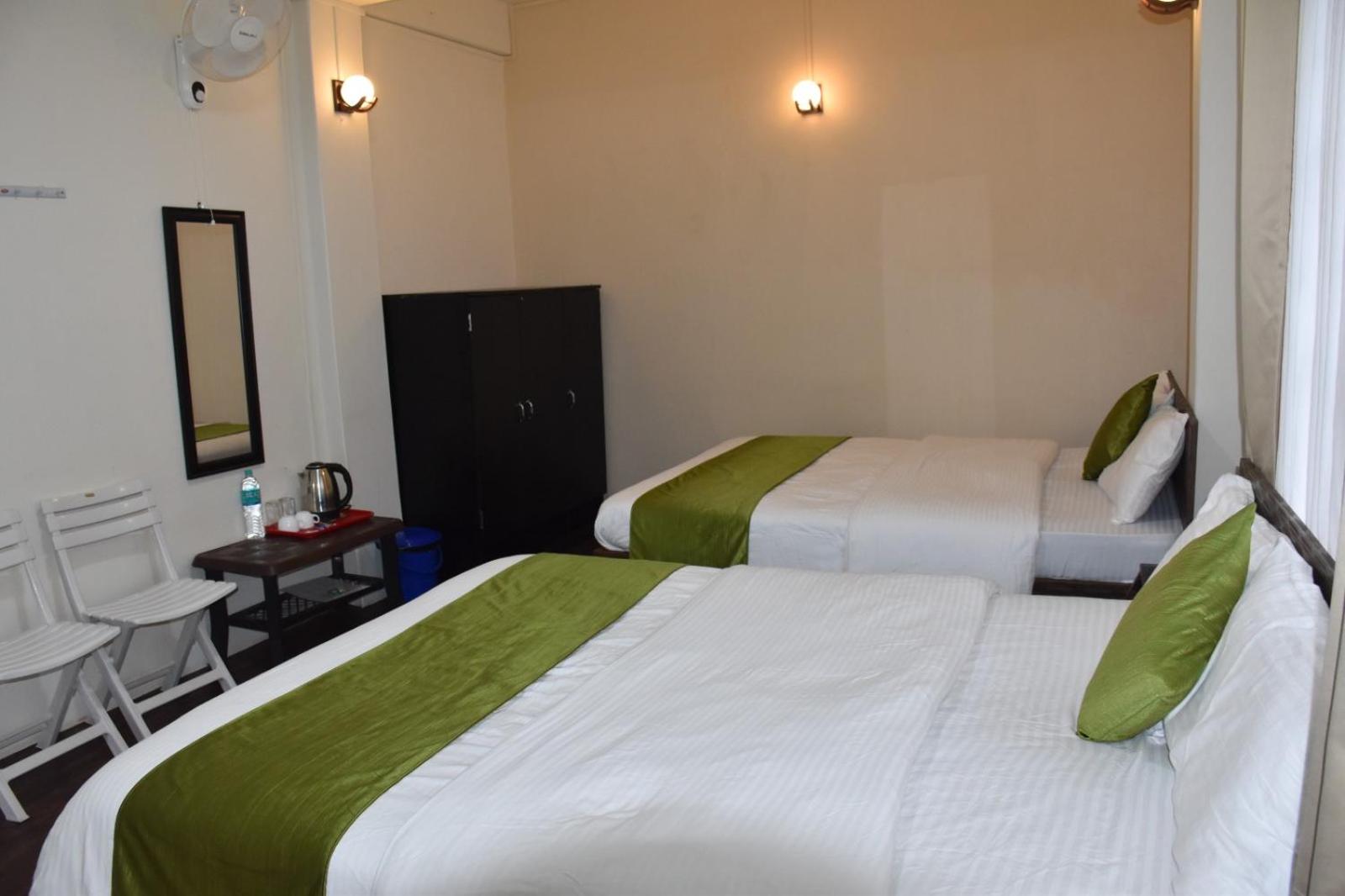 Deluxe Queen Room with Two Queen Beds photo 1