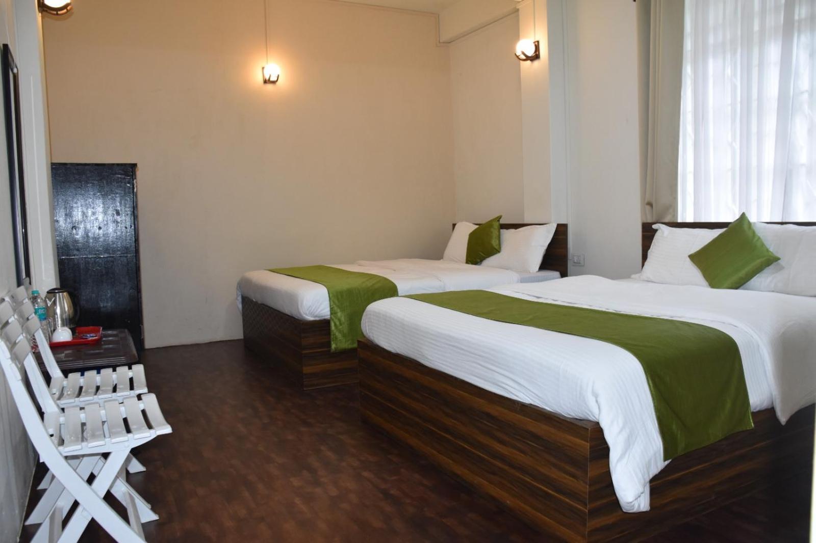 Deluxe Queen Room with Two Queen Beds photo 2