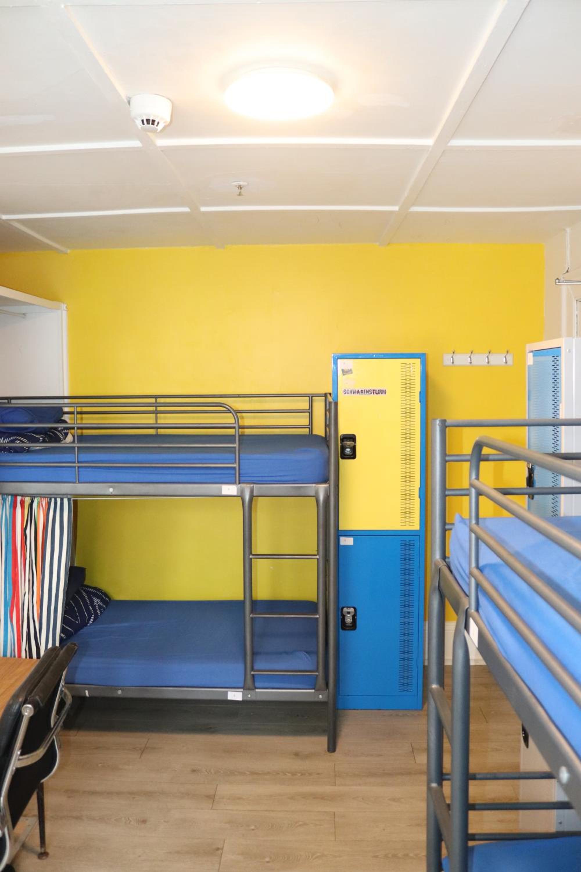 Bed in 8-Bed Dormitory Room with Shared Bathroom (age 18-36 years) photo 3