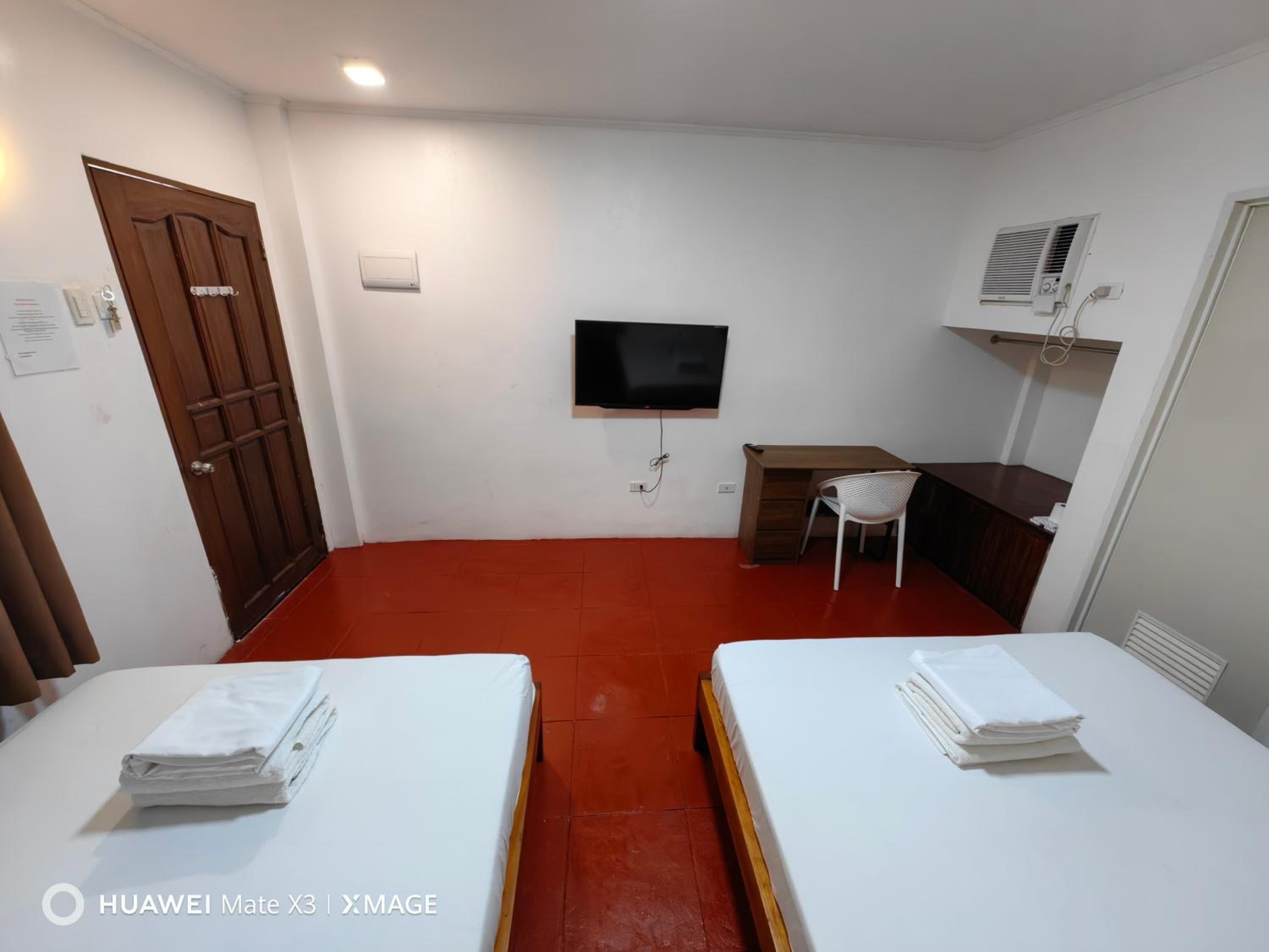 Deluxe Queen Room with Two Queen Beds - Photo 1
