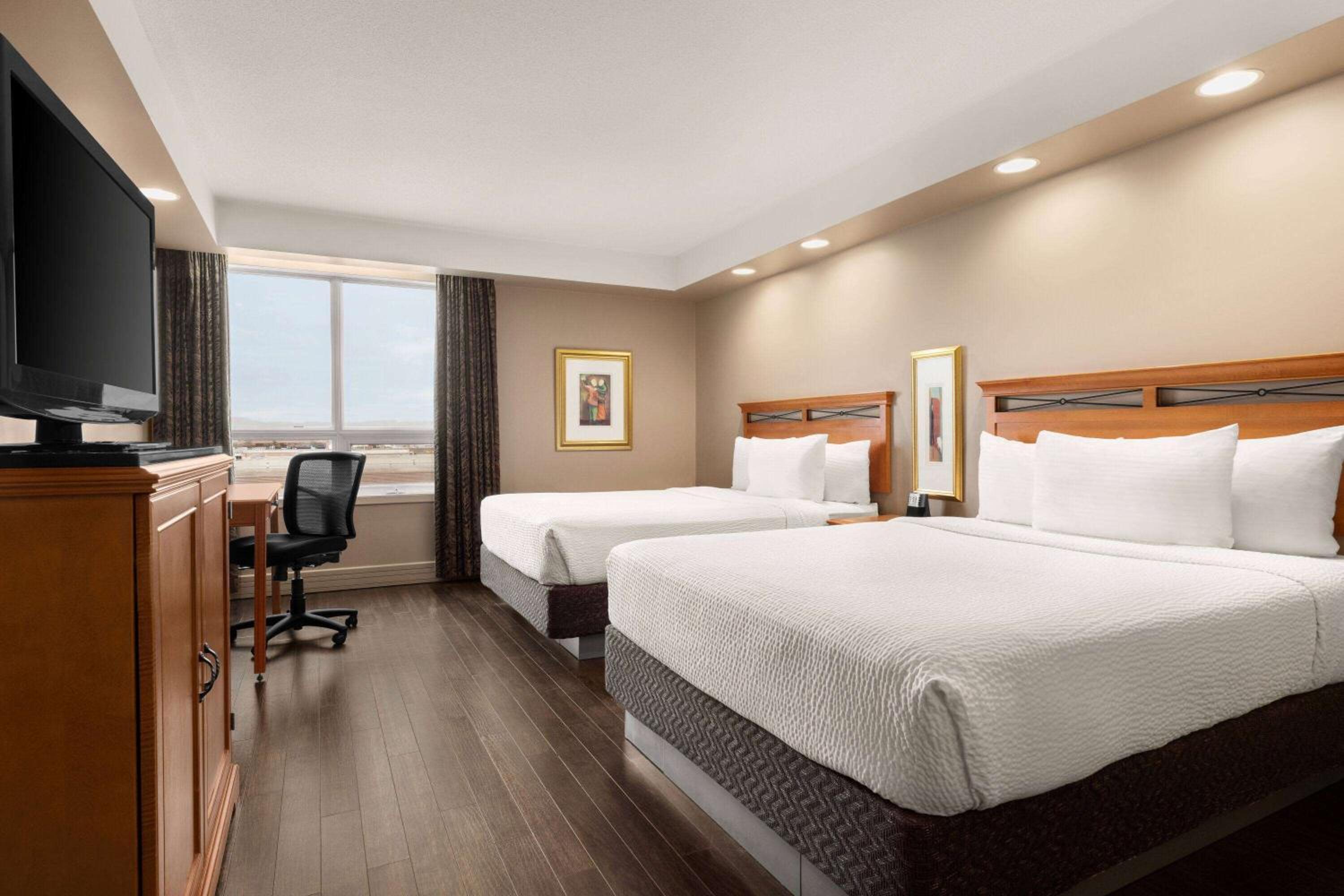 Queen Room with Two Queen Beds - Non-Smoking - Photo 1