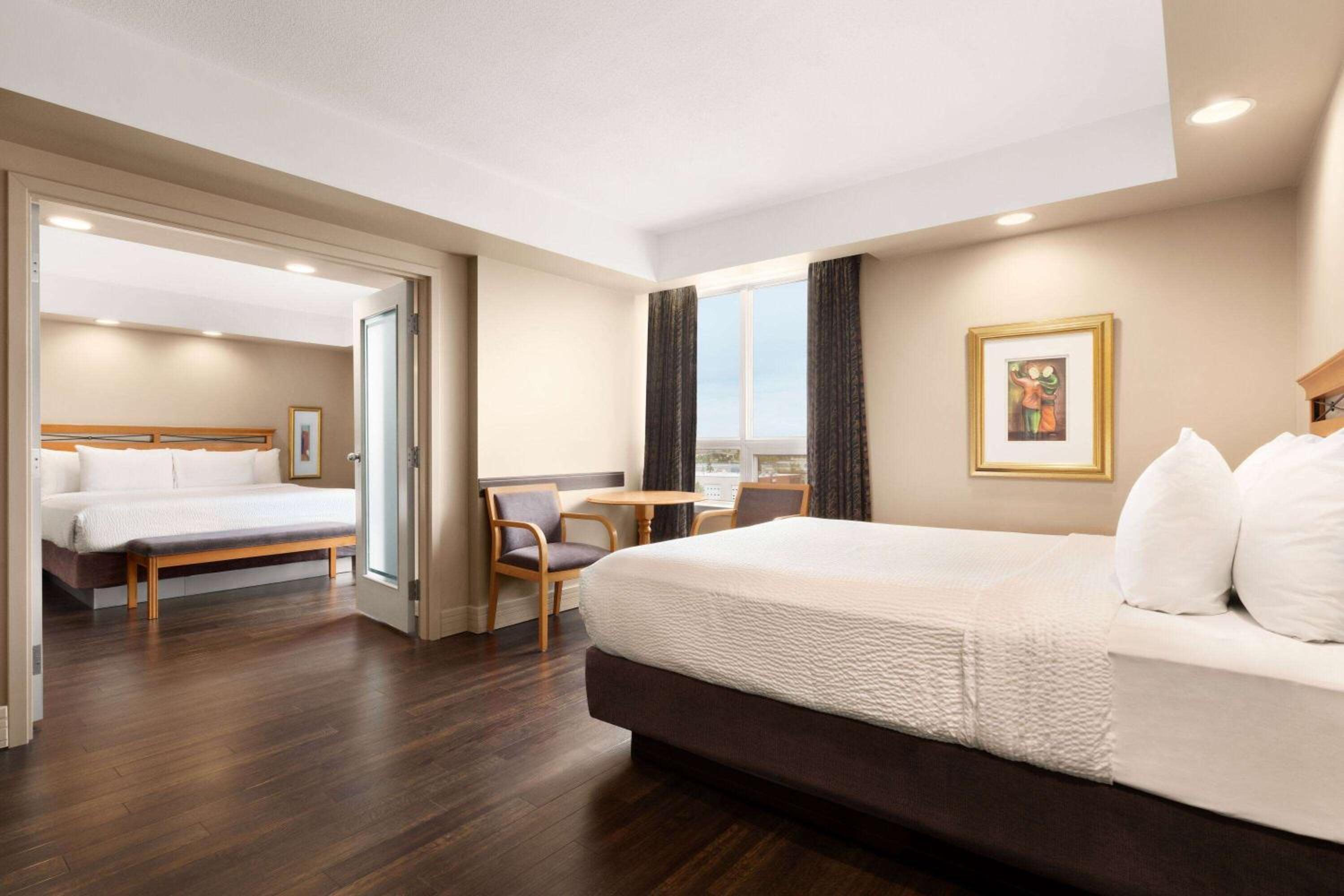 1 King Bed and 1 Queen Bed, One-Bedroom, Family Suite, Non-Smoking