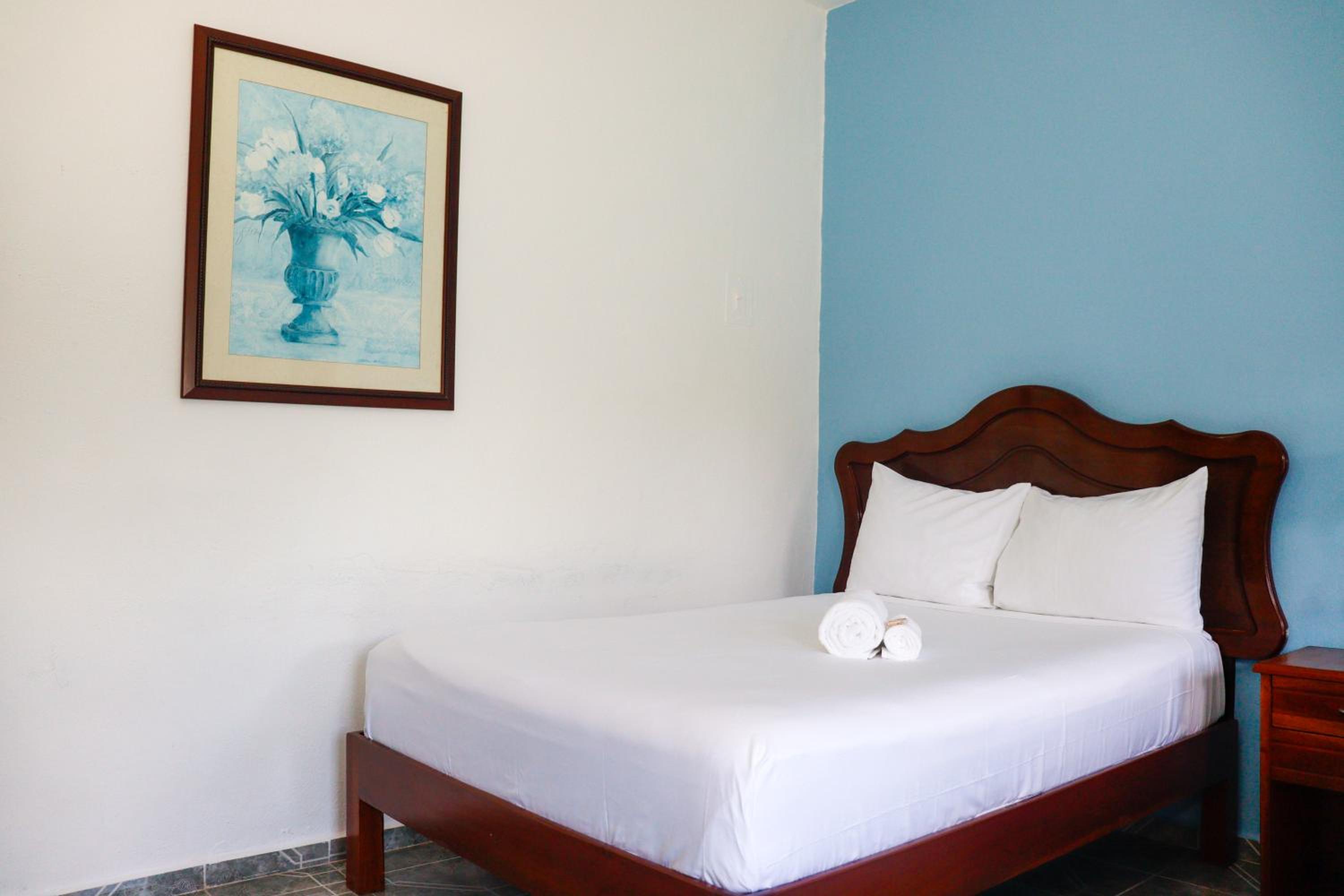 Deluxe Queen Room with Two Queen Beds - Photo 1