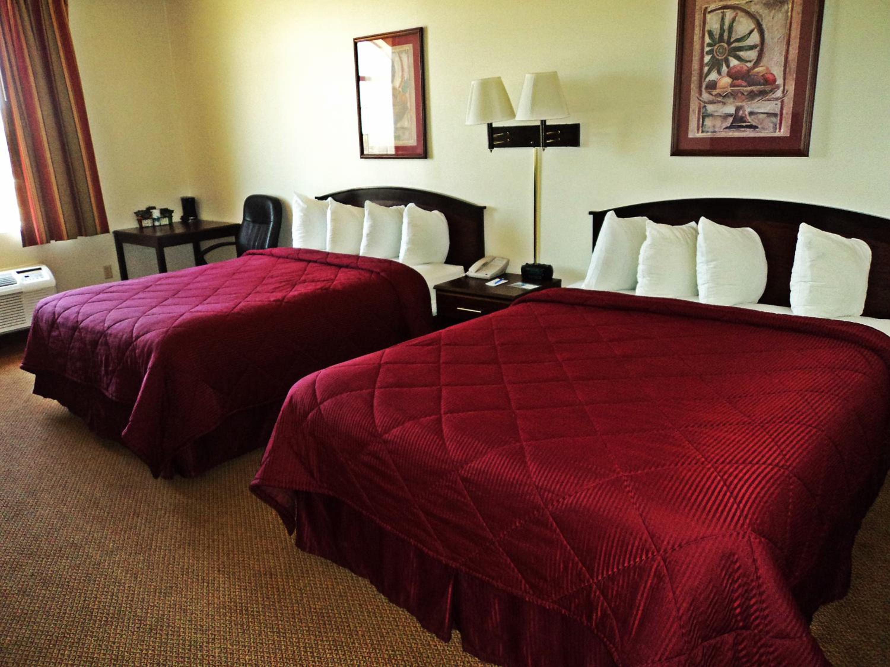 Queen Room with Two Queen Beds and Bath Tub - Mobility/Hearing Accessible - Non-Smoking - Photo 1