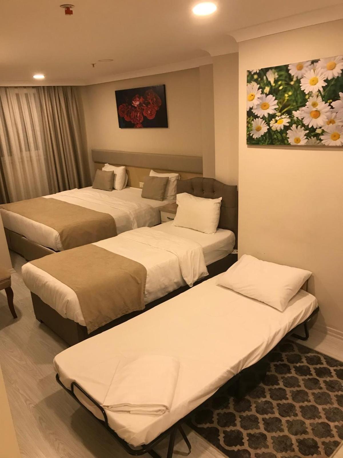 Quadruple Room - Photo 1