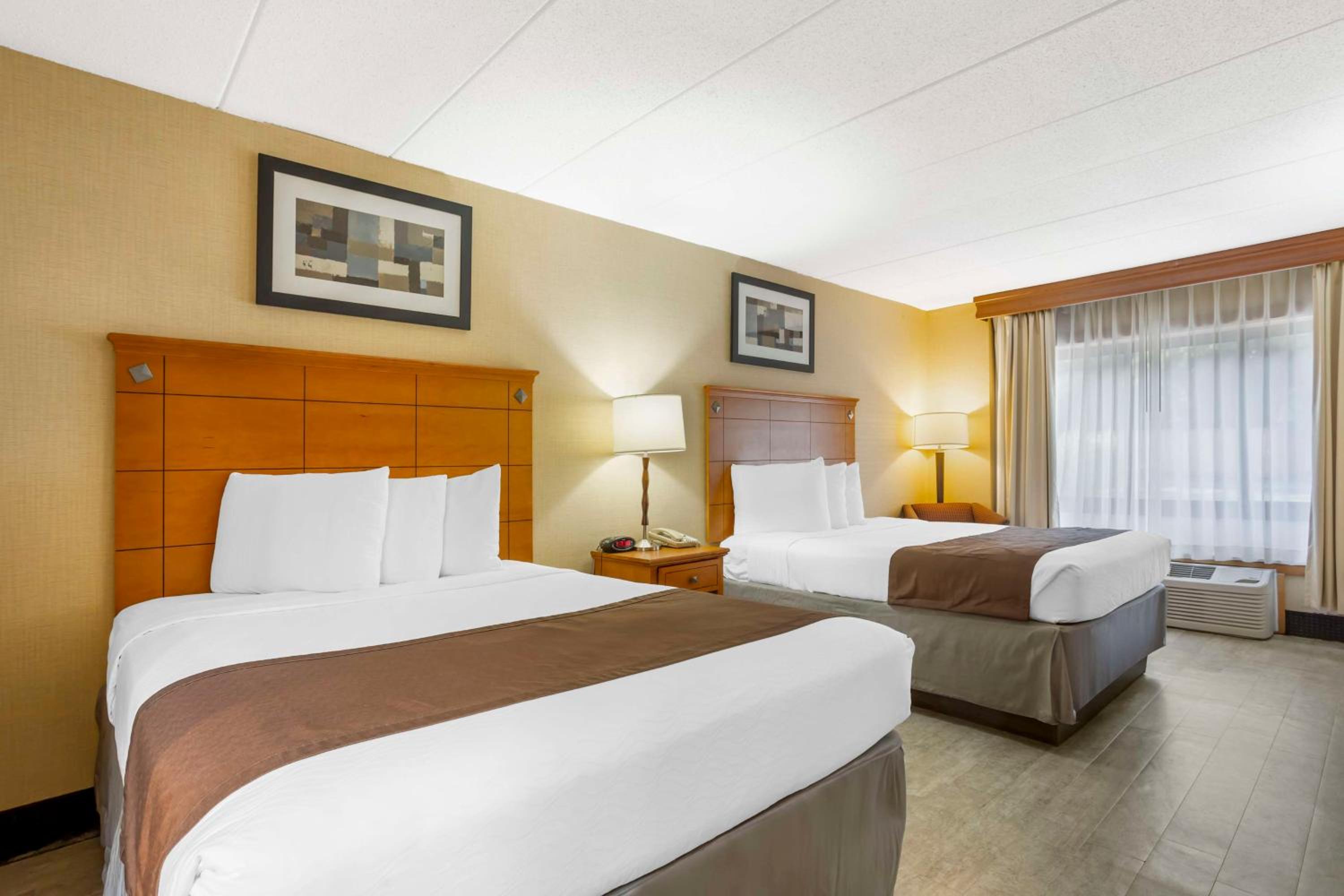 Queen Room with Two Queen Beds - Photo 1