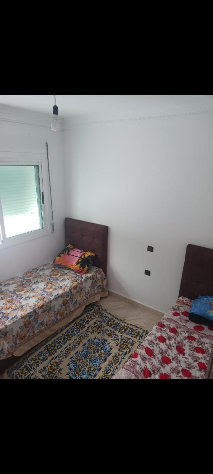 Three-Bedroom Apartment photo 2