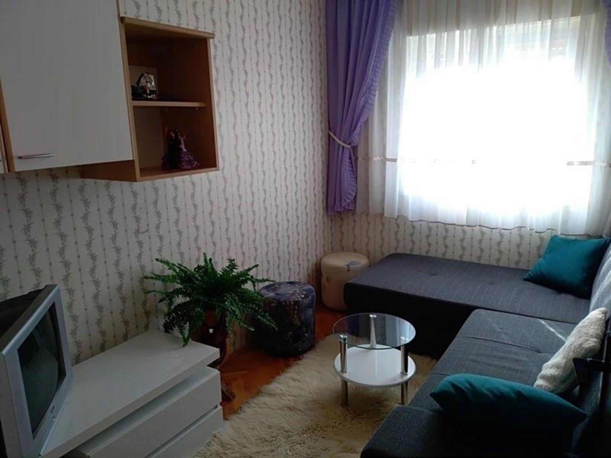 Three-Bedroom Apartment photo 1