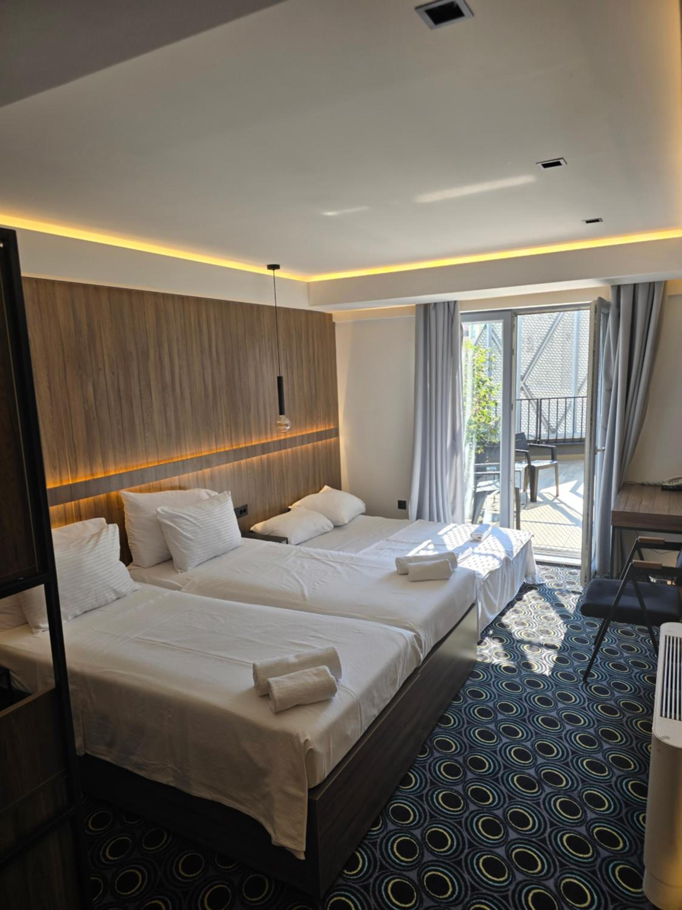 Family Room with Balcony - Photo 1
