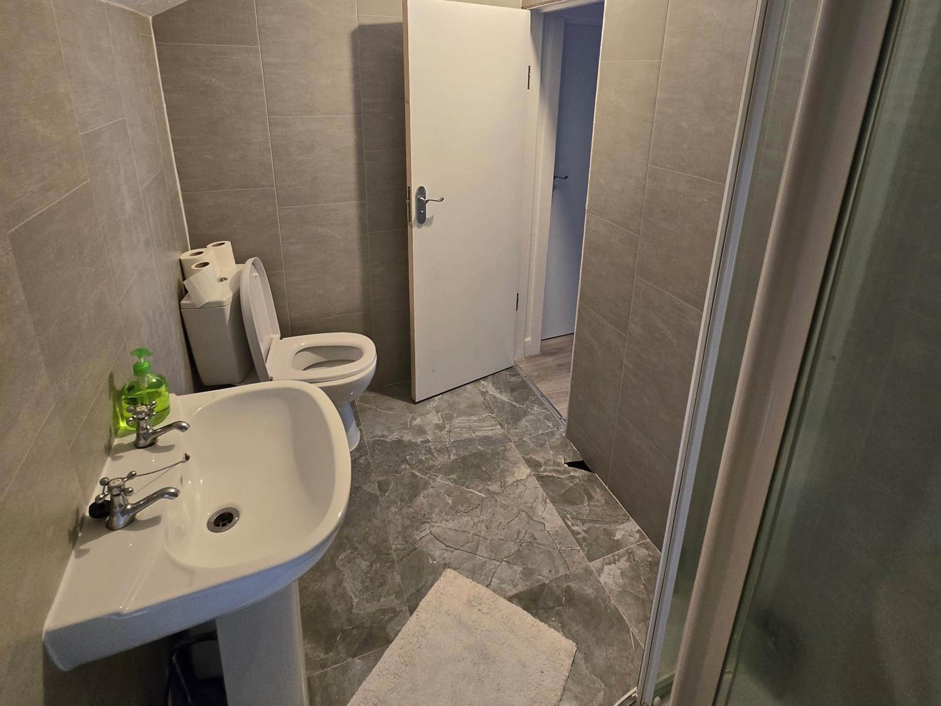 Family Room With Shared Bathroom