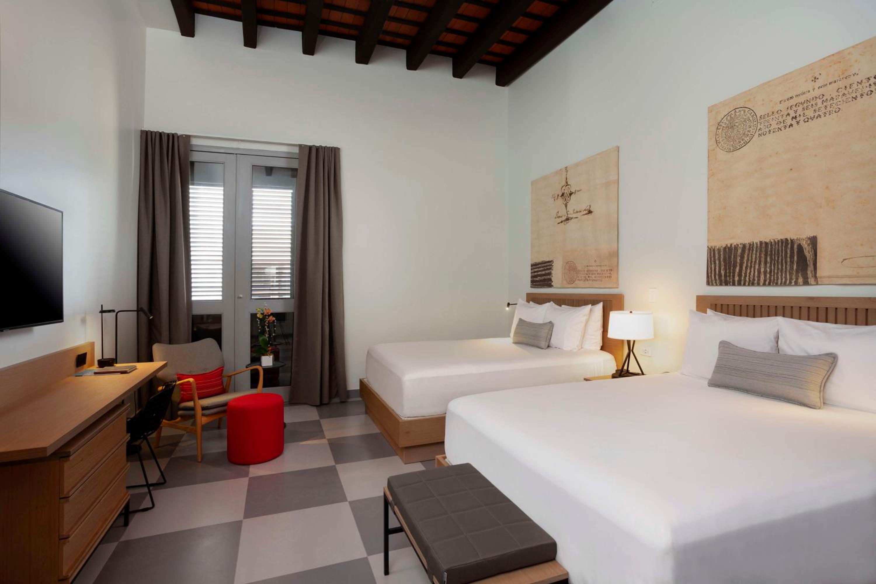 Deputy Queen Room with Two Queen Beds - Photo 1