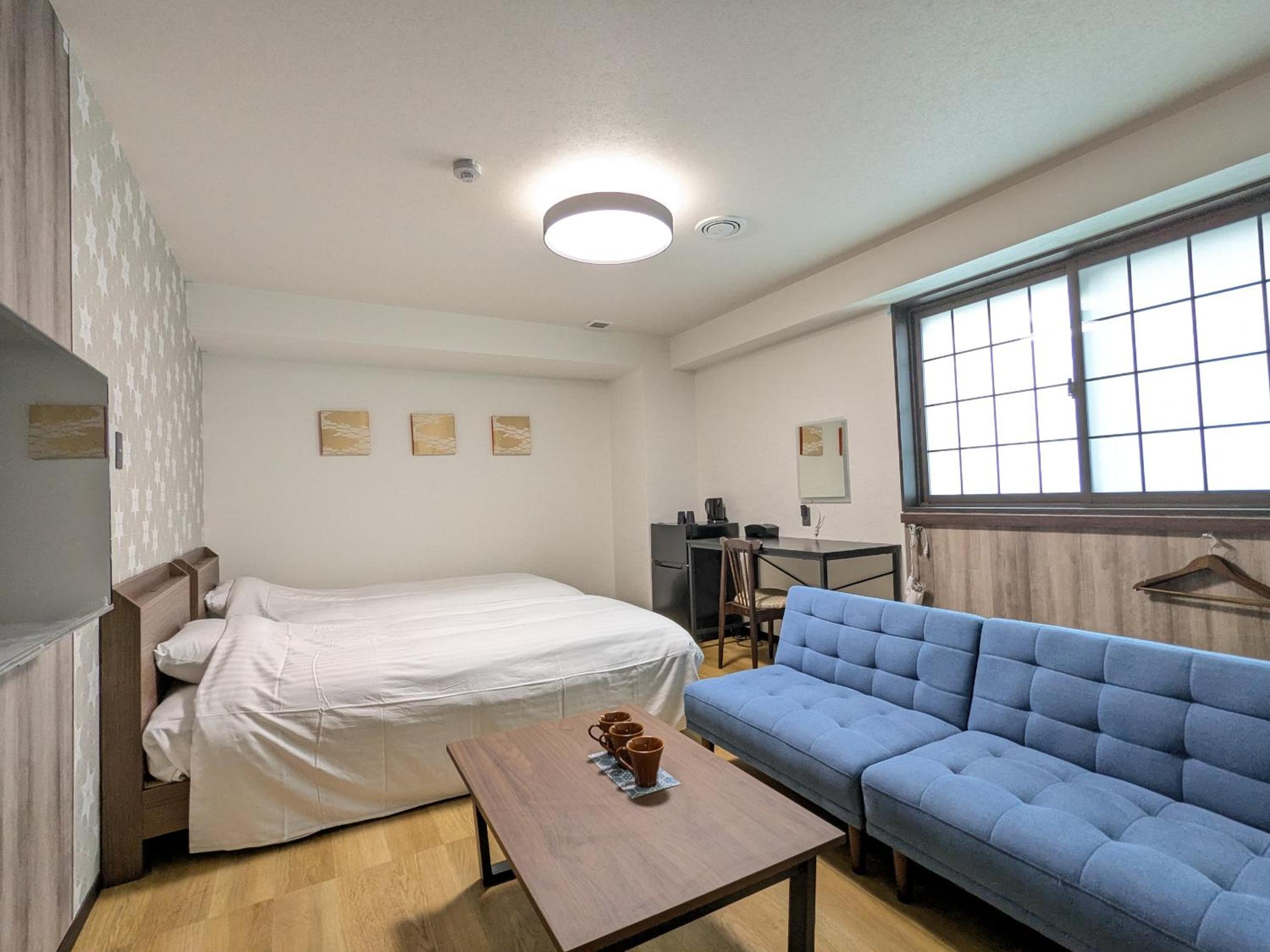 Economy Triple Room photo 3